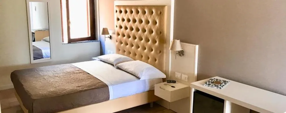 Bed in Hotel Marina del Capo