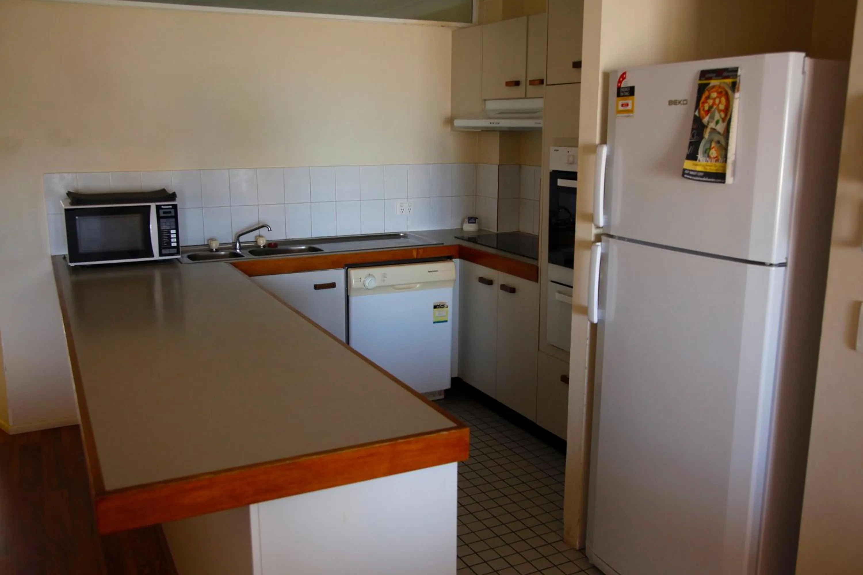 Kitchen or kitchenette in Sandrift Beachfront Apartments