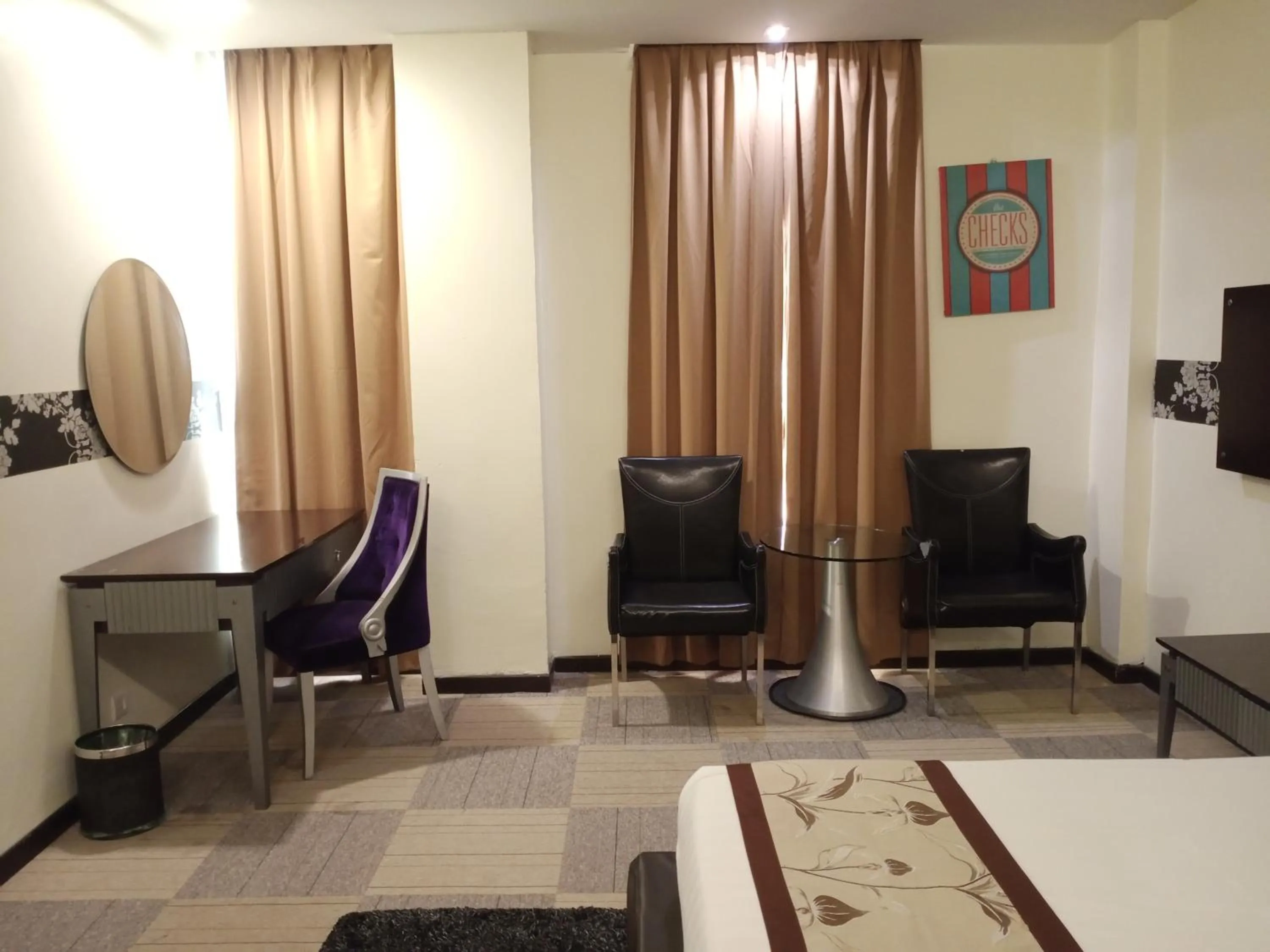 Seating area, Bed in Shervinton Executive Boutique Hotel