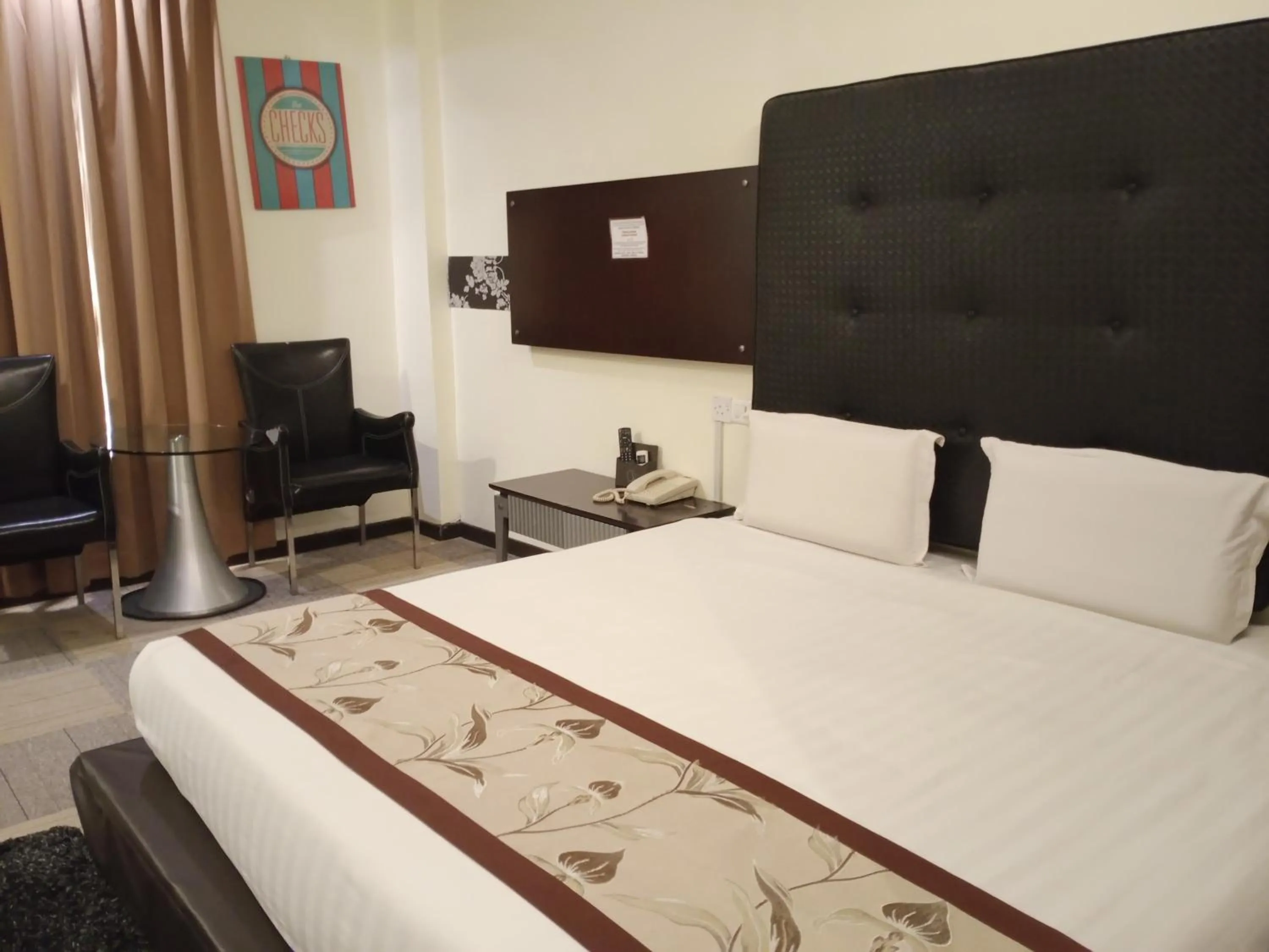 Bed in Shervinton Executive Boutique Hotel