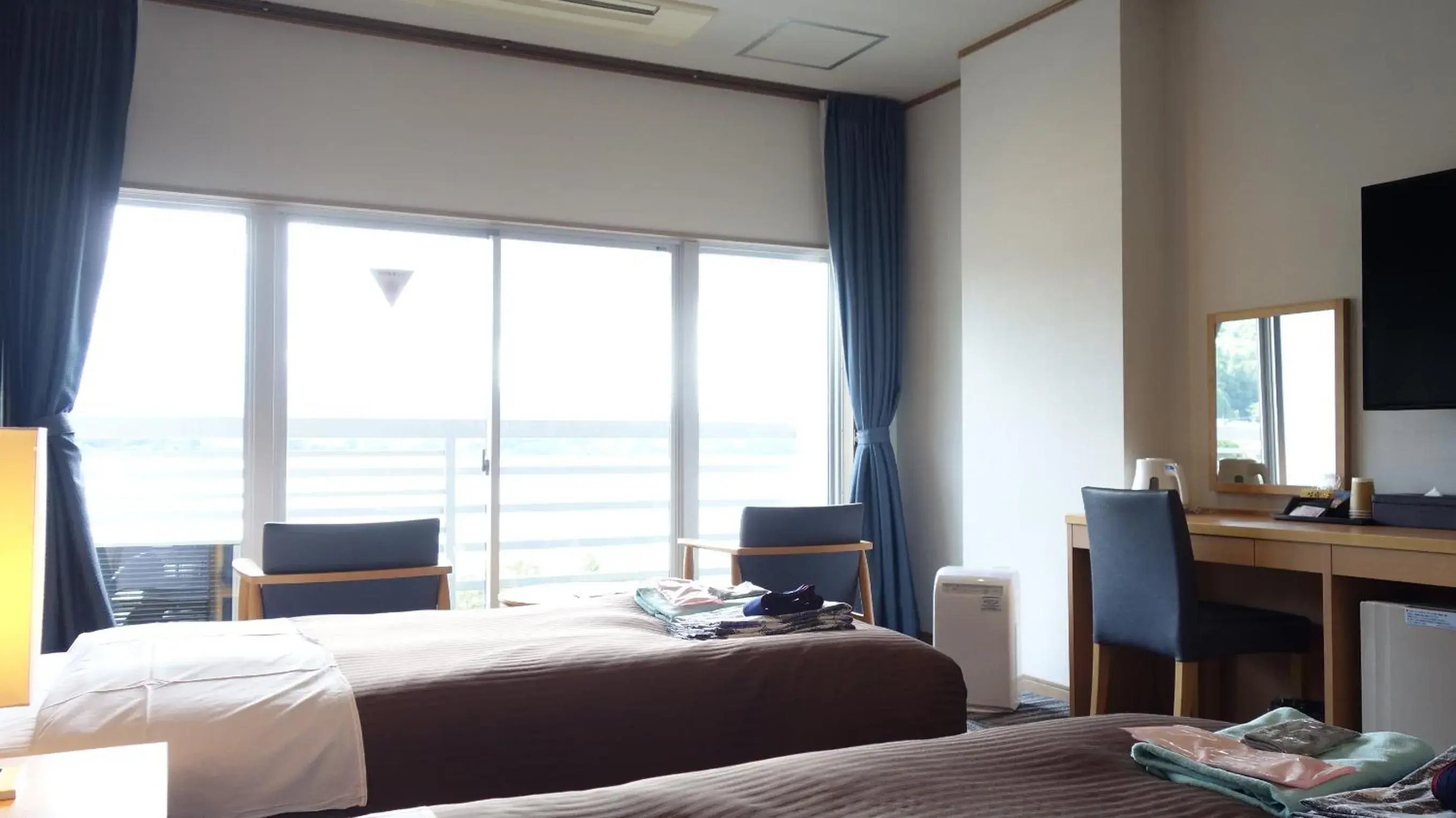 Photo of the whole room in Hotel New Century Photo of the whole room in Hotel New Century