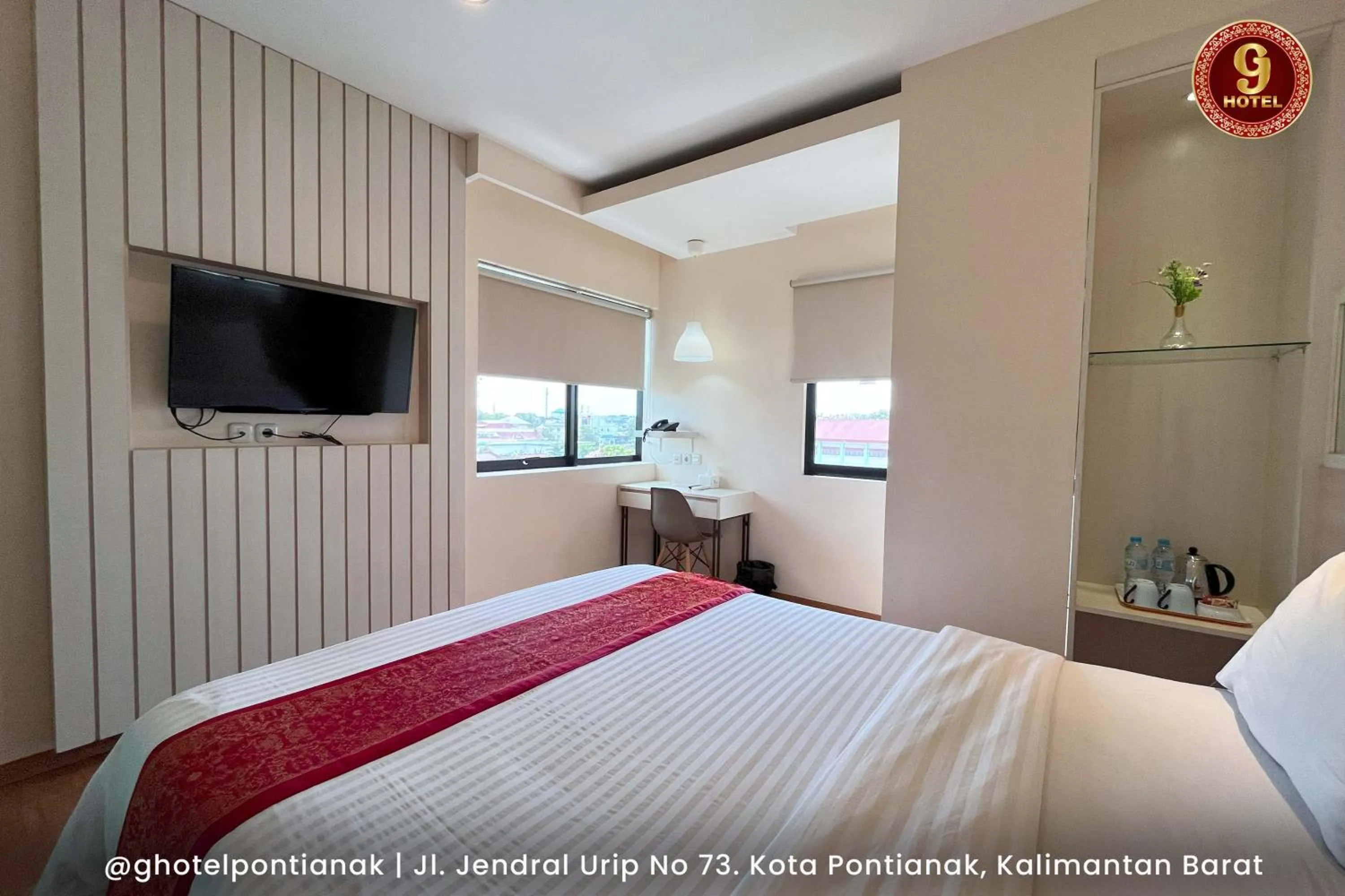 Bed in G-Hotel Pontianak