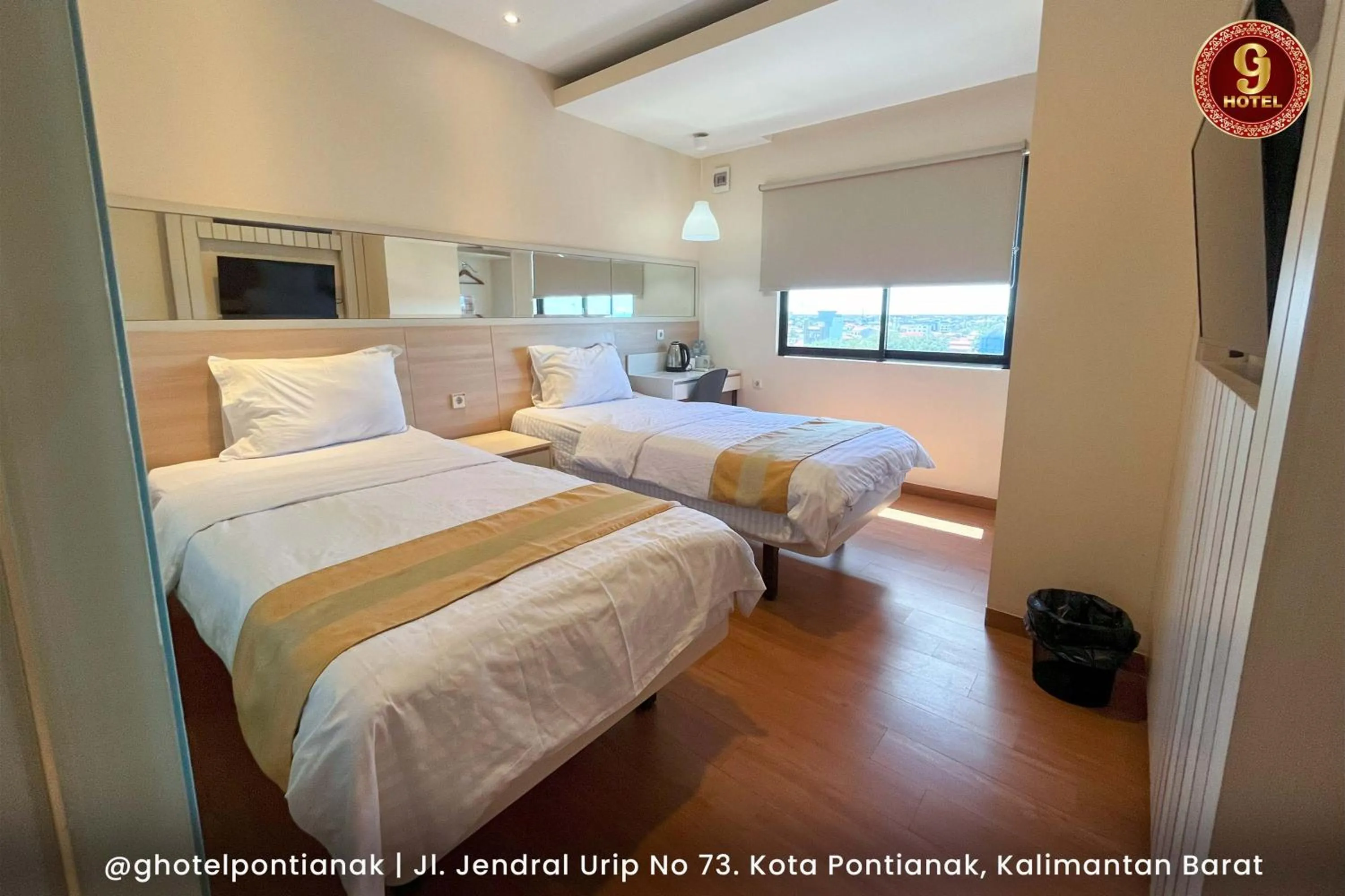 Bed in G-Hotel Pontianak