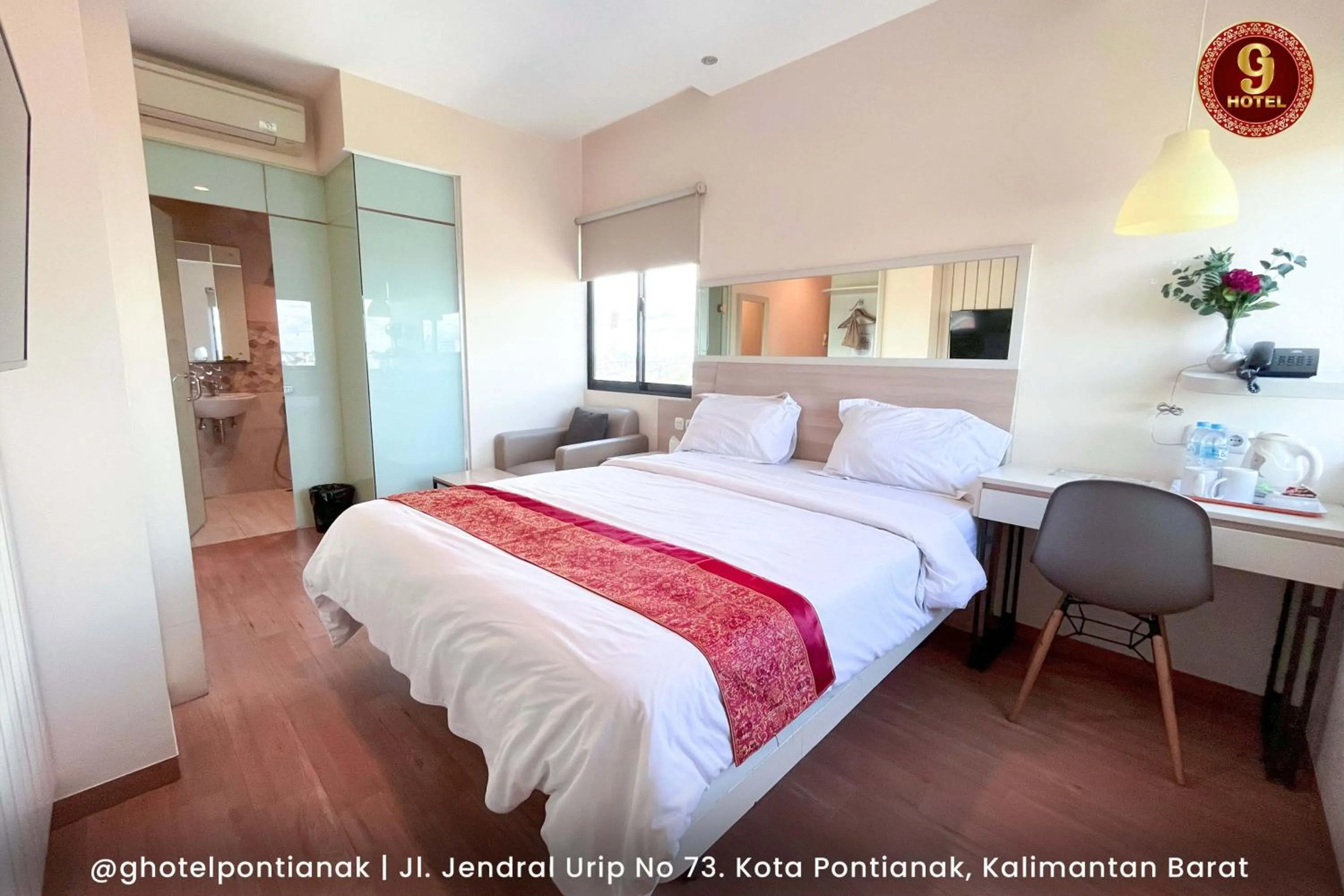 Bed in G-Hotel Pontianak