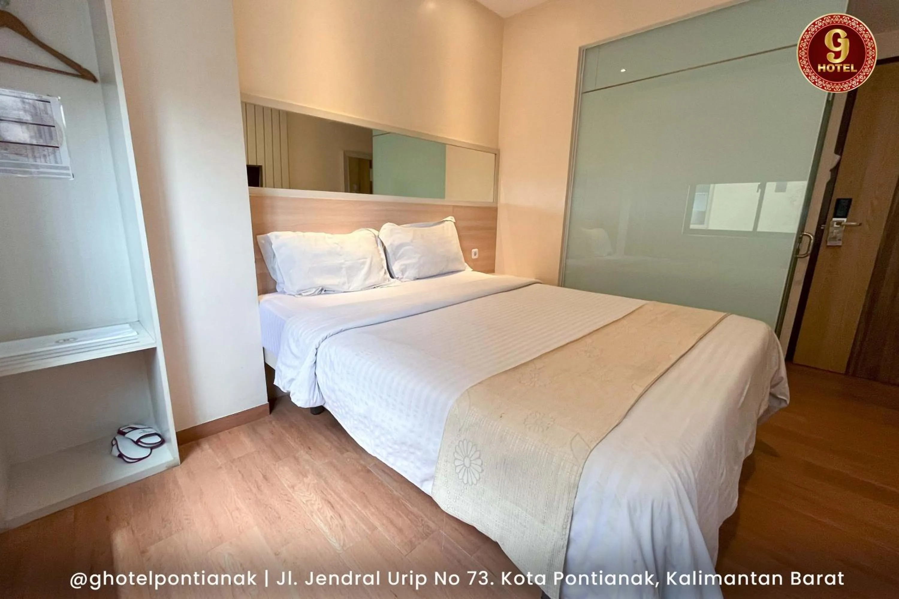 Bed in G-Hotel Pontianak