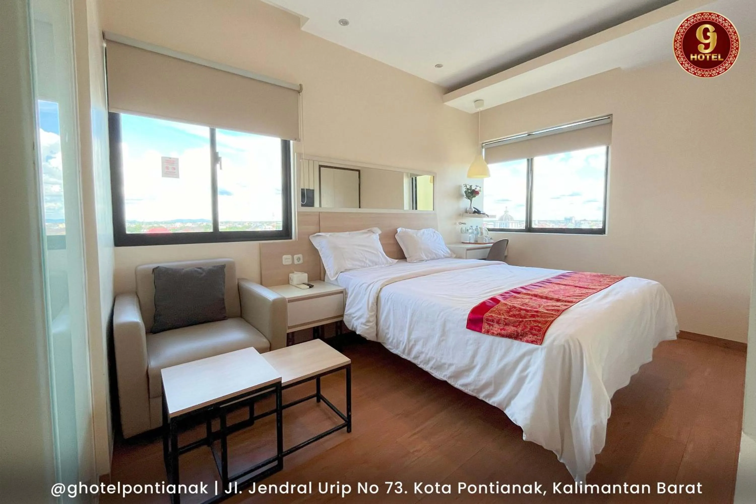 Bed in G-Hotel Pontianak