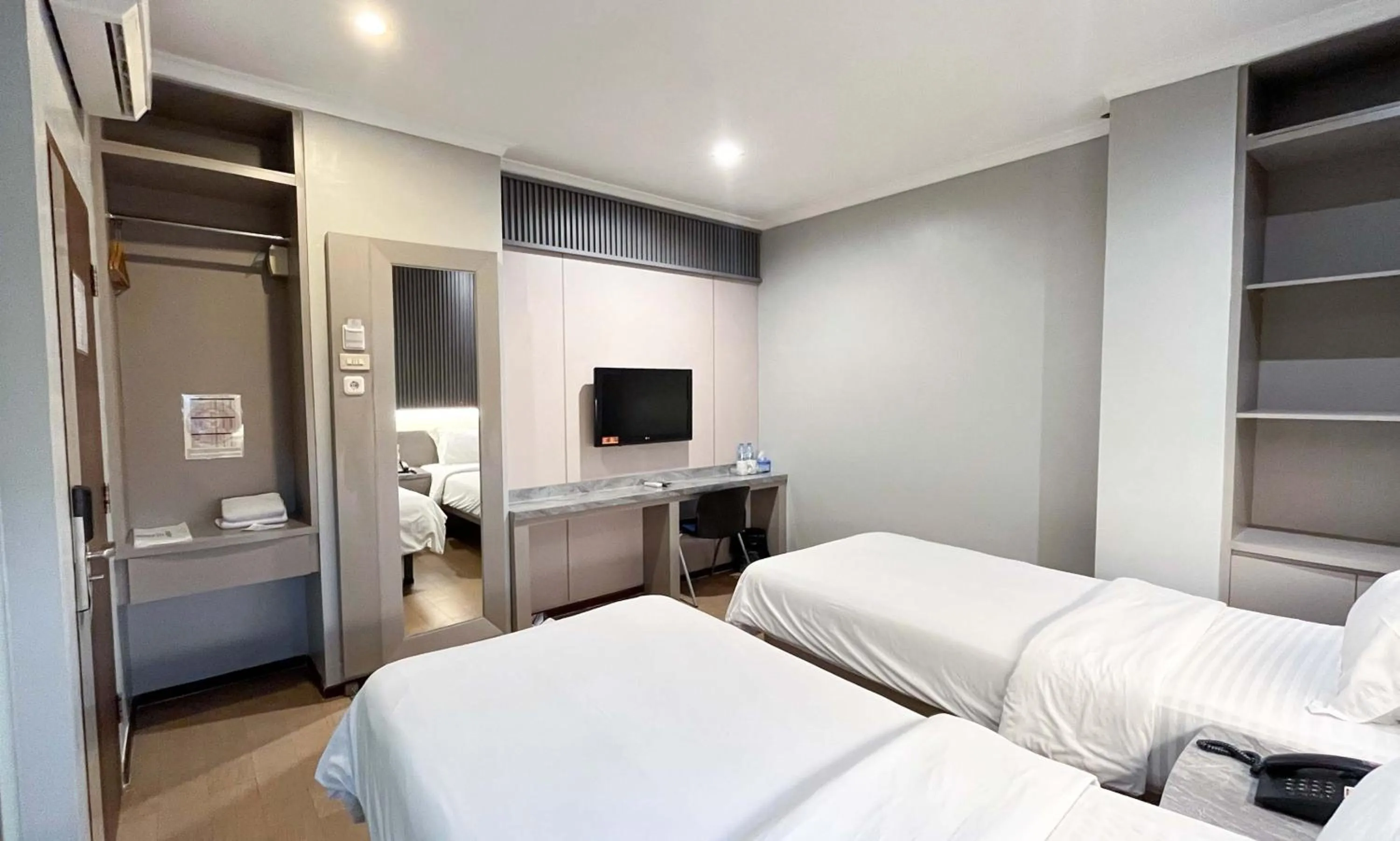 Bed in G-Hotel Pontianak