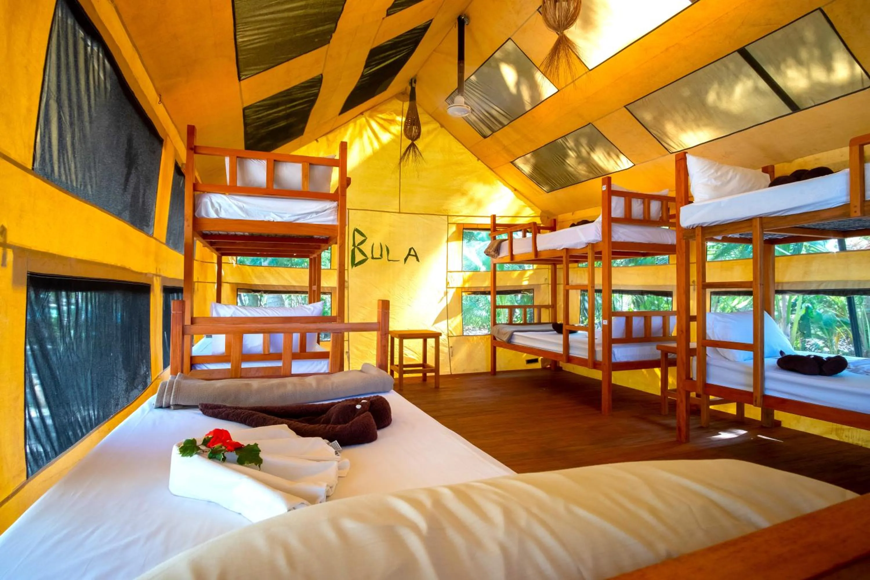 Bed in Barefoot Manta Island Resort