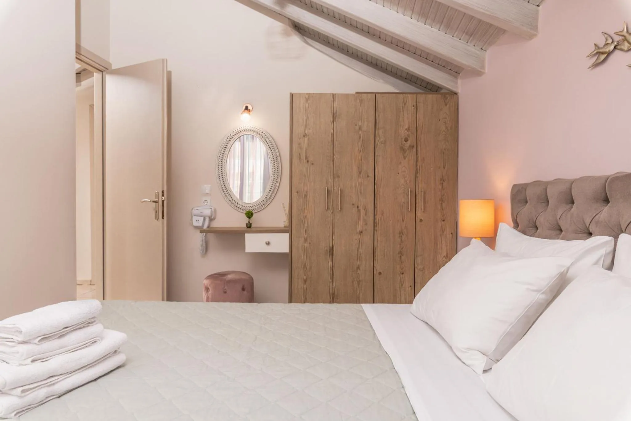 Bed in Koukos Loft Apartments