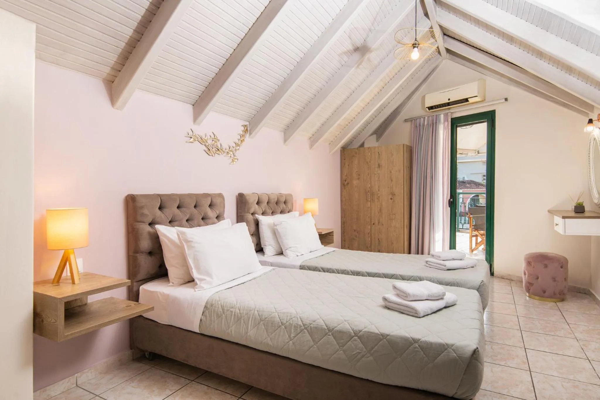 Bed in Koukos Loft Apartments