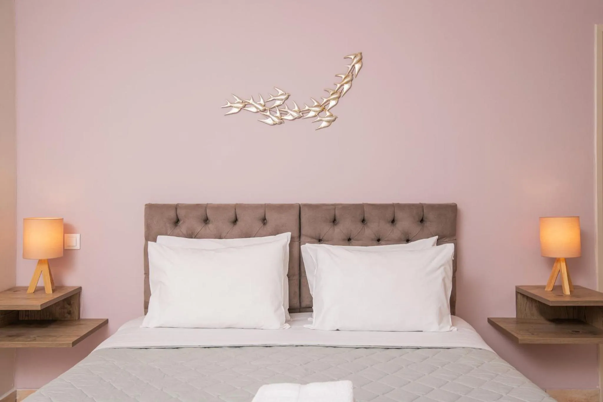 Bed in Koukos Loft Apartments