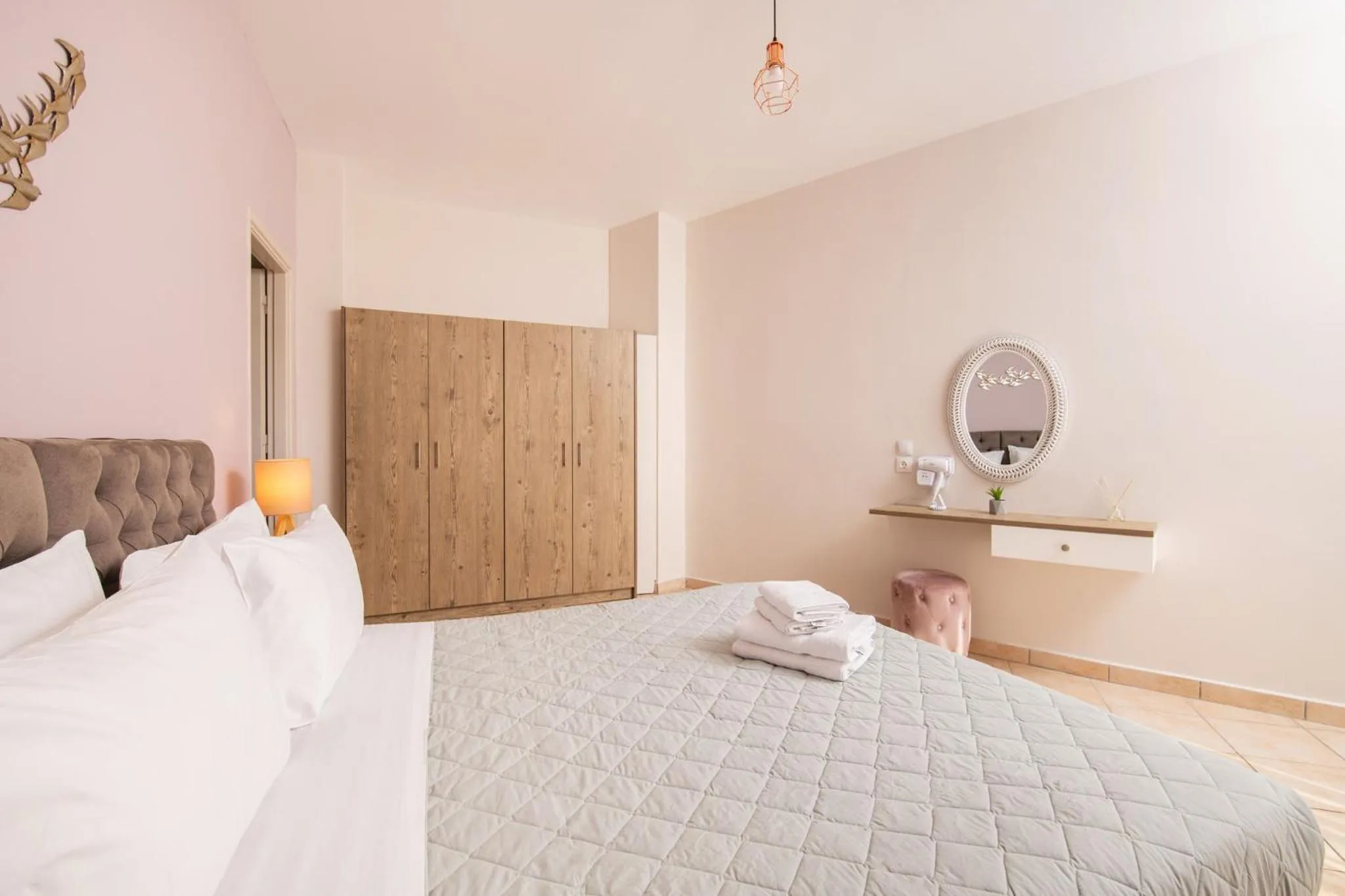 Bed in Koukos Loft Apartments