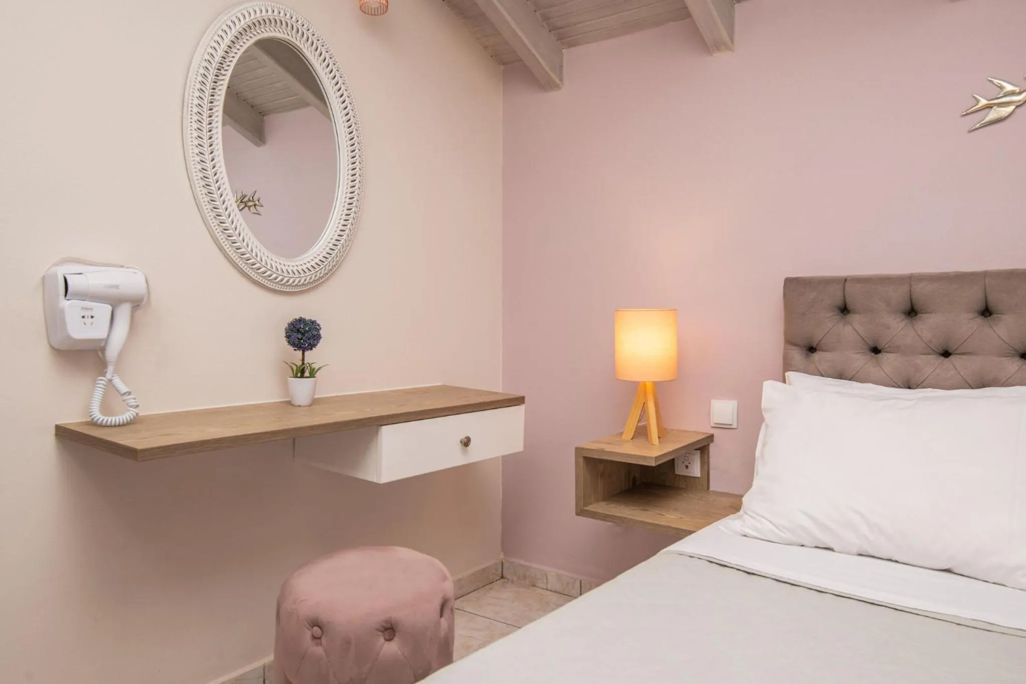 Bed in Koukos Loft Apartments