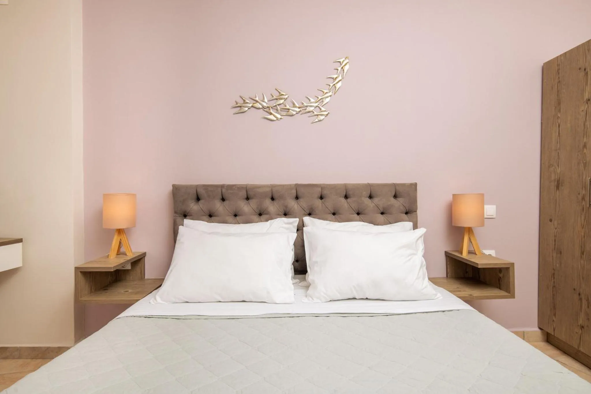 Bed in Koukos Loft Apartments