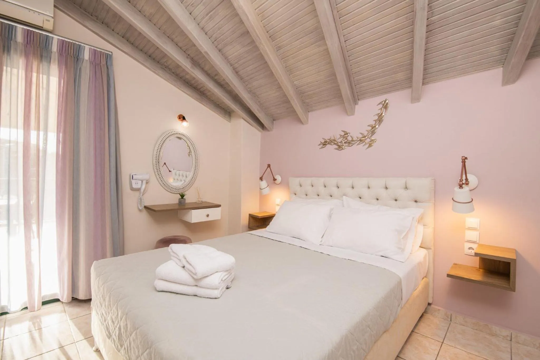 Bed in Koukos Loft Apartments