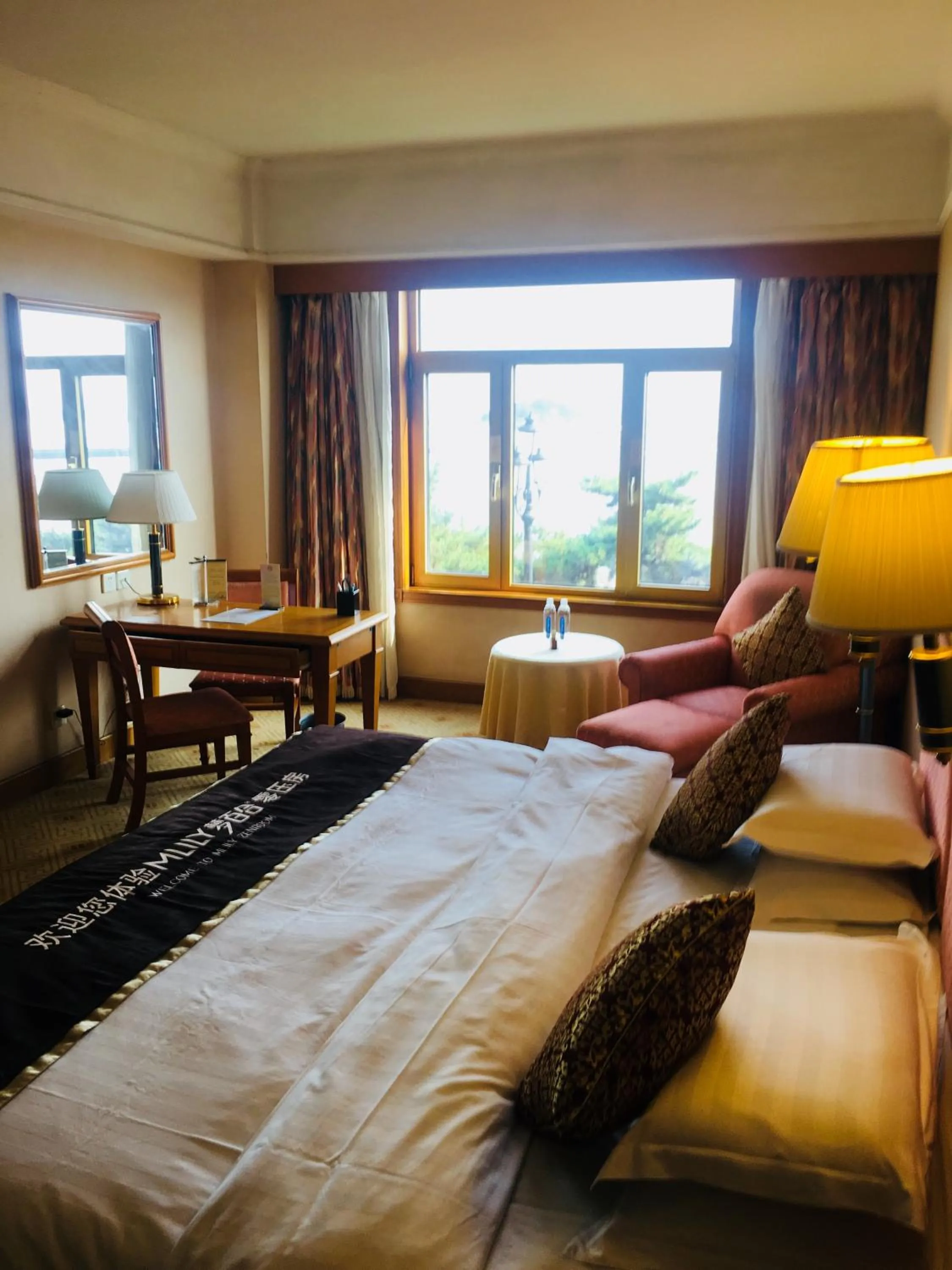 Bed in Qingdao Oceanwide Elite Hotel