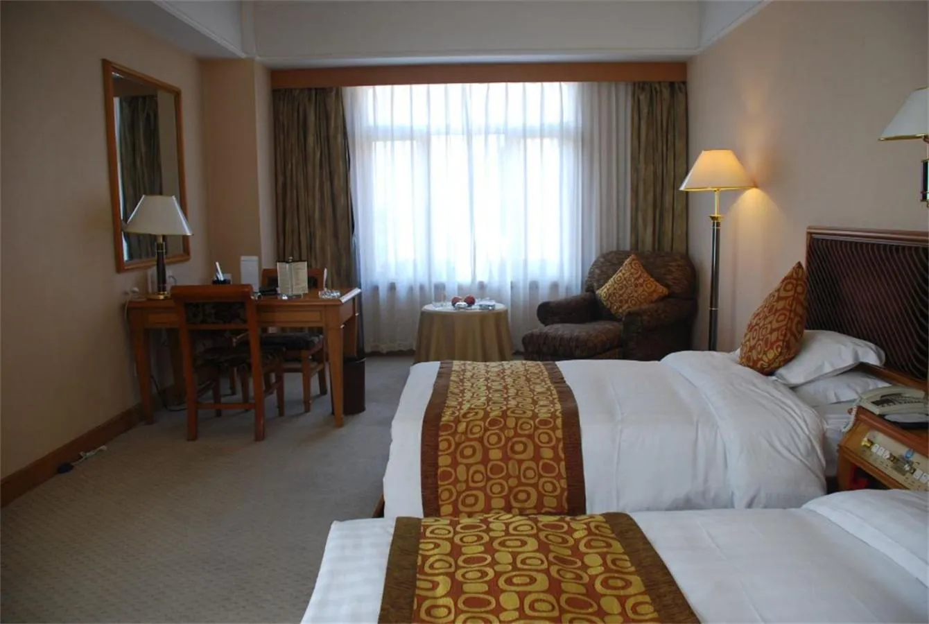 Bed in Qingdao Oceanwide Elite Hotel