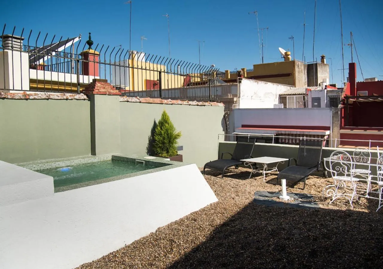 Swimming pool in Slow Suites Maestranza