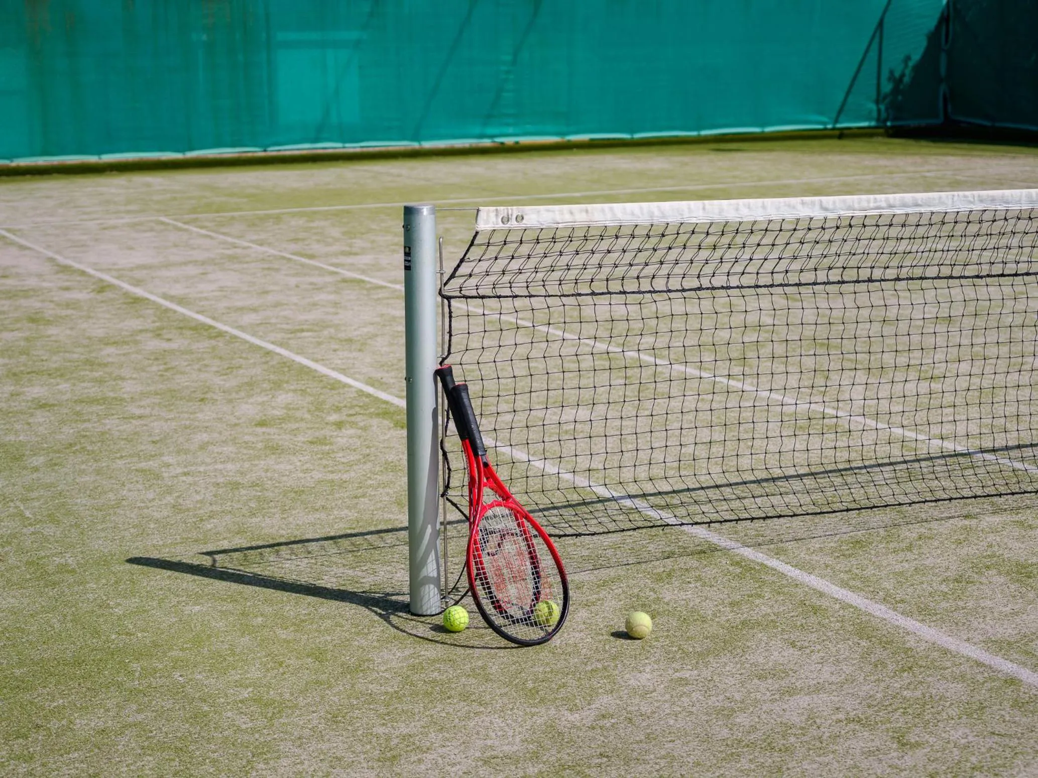 Tennis court in Aegean Melathron Thalasso Spa Hotel