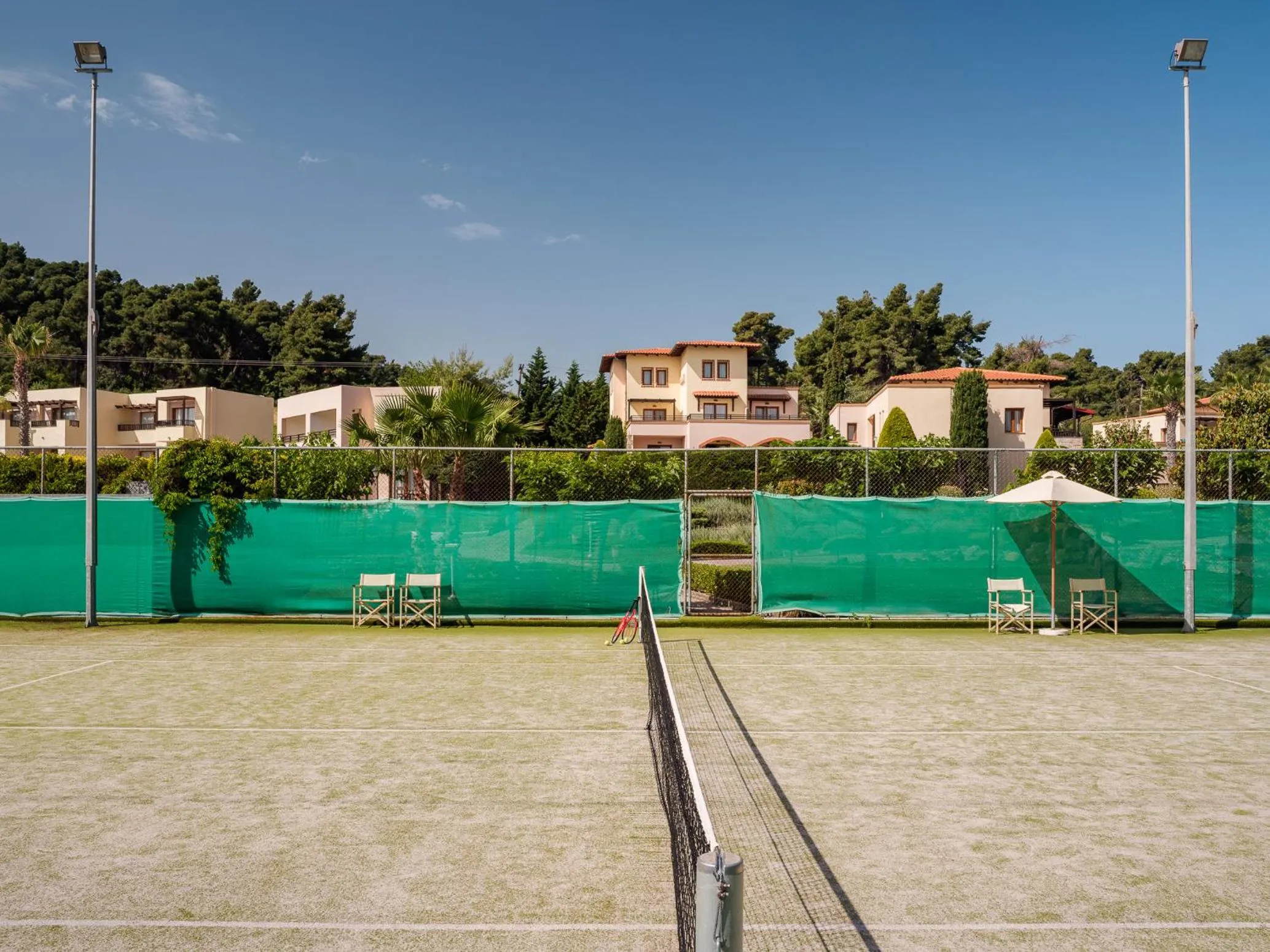 Tennis court in Aegean Melathron Thalasso Spa Hotel