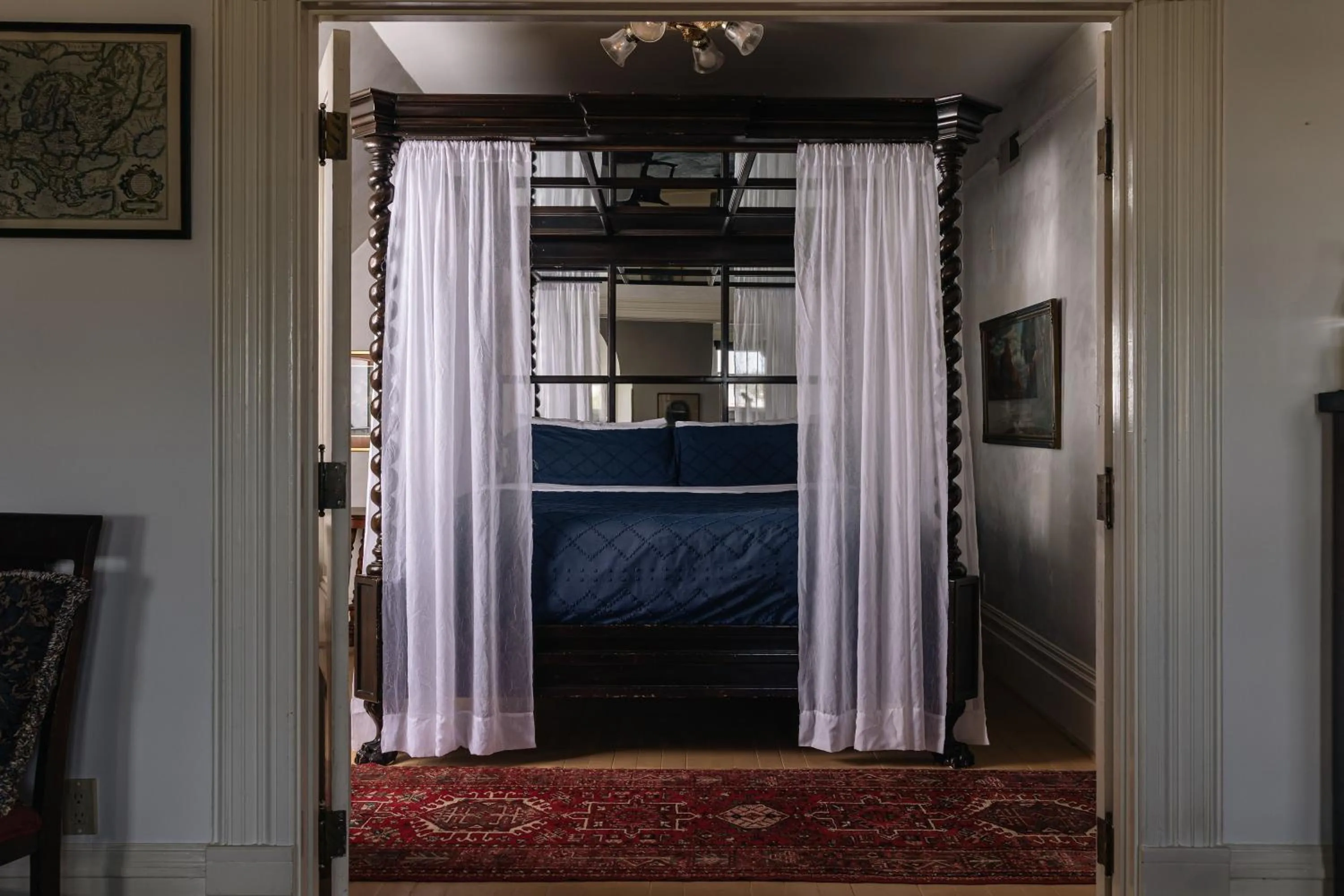 Bedroom in Chateau Tivoli Bed and Breakfast