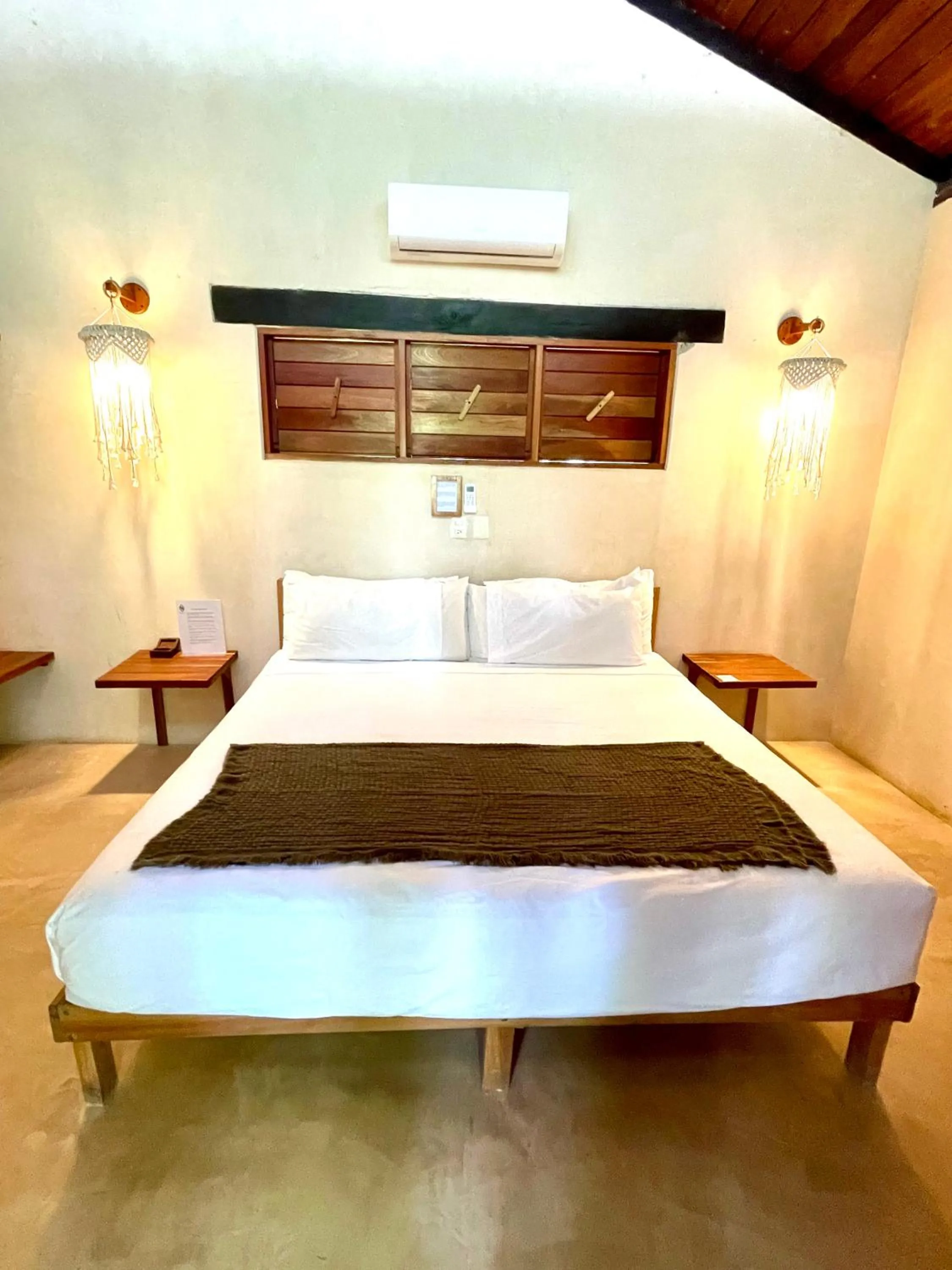 Bed in Hotel Buenavista Bacalar Jungle Experience