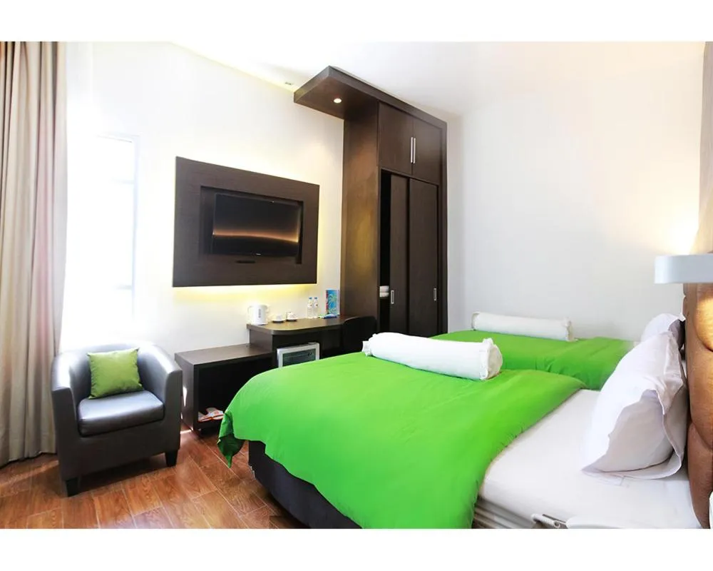 Bed in Emerald Hotel