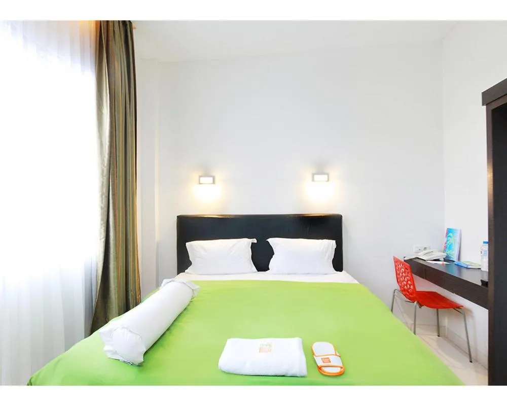 Bed in Emerald Hotel