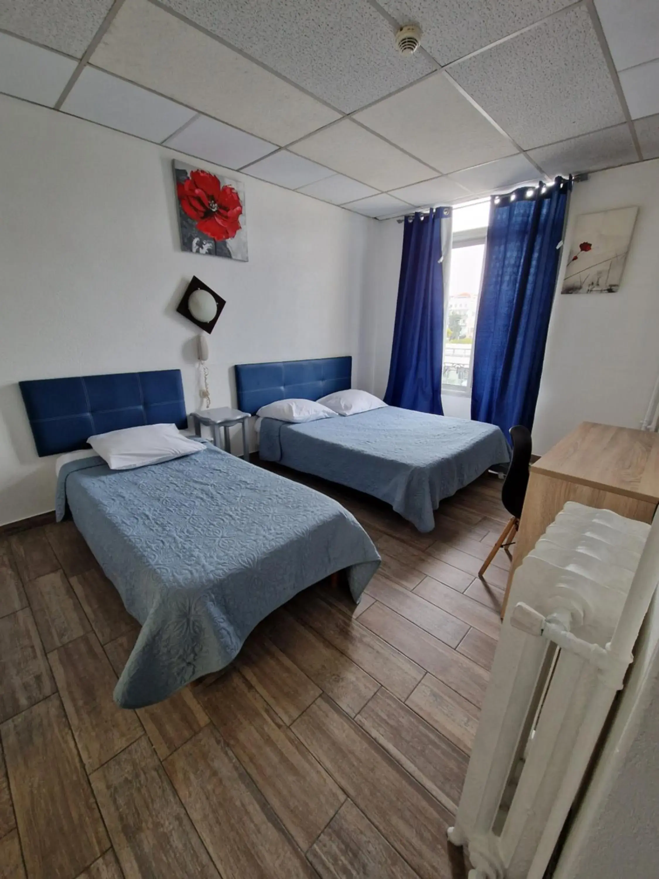 Triple Room in Hôtel du Nord Triple Room in Hôtel du Nord