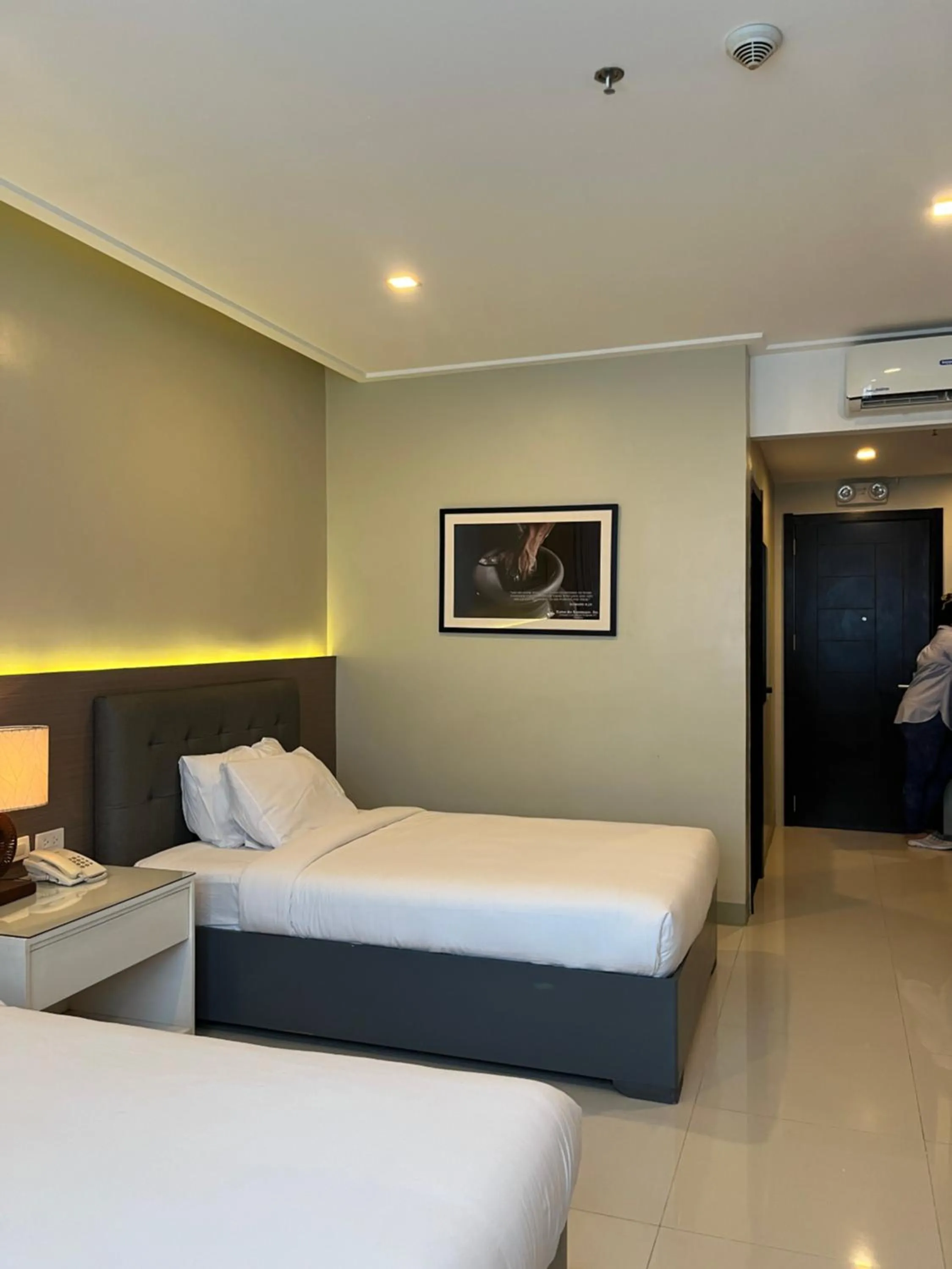 Bed in Iloilo Gateway Hotel and Suites