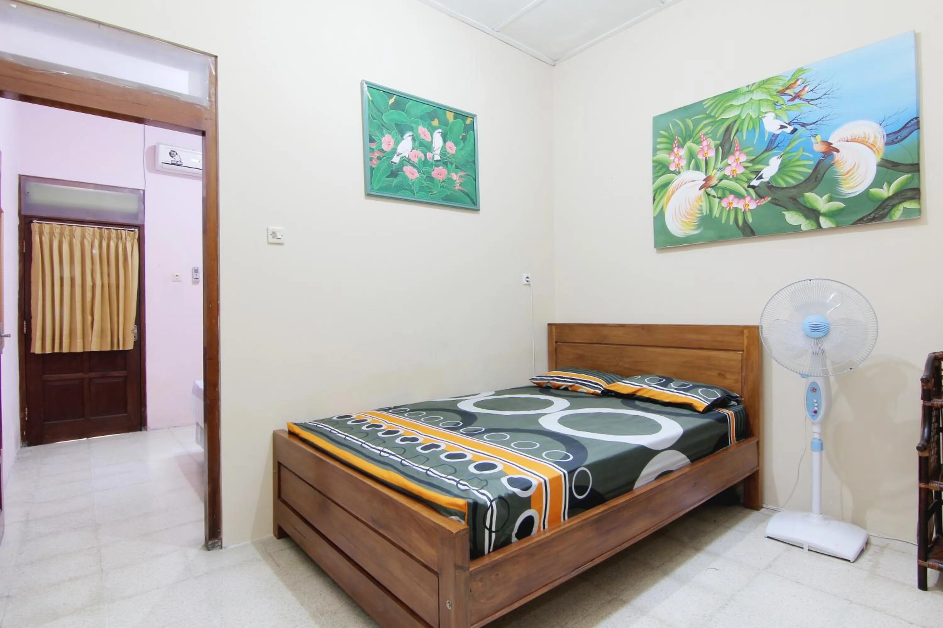 Bed in Batik Trinidar Homestay