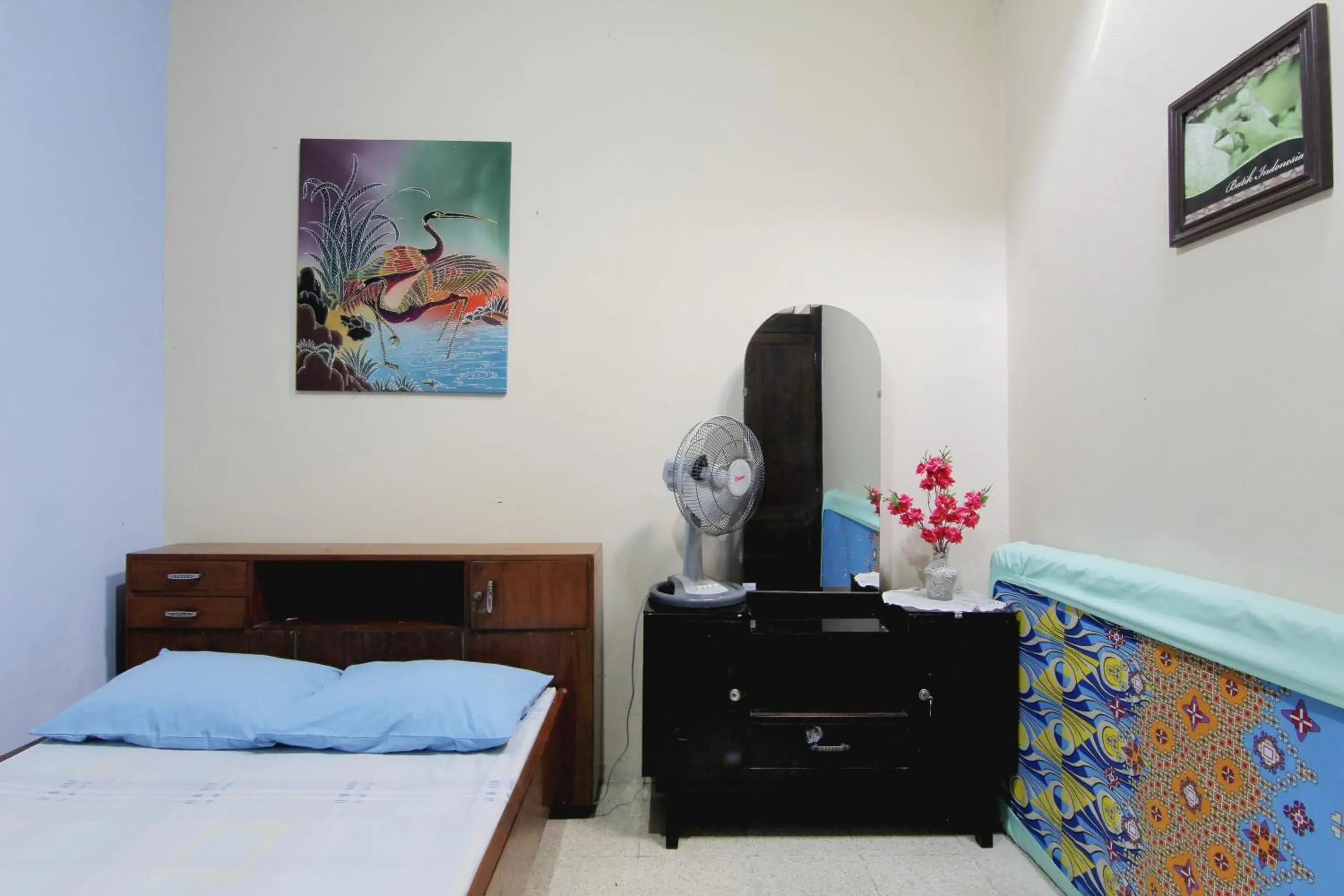 Bed in Batik Trinidar Homestay Bed in Batik Trinidar Homestay