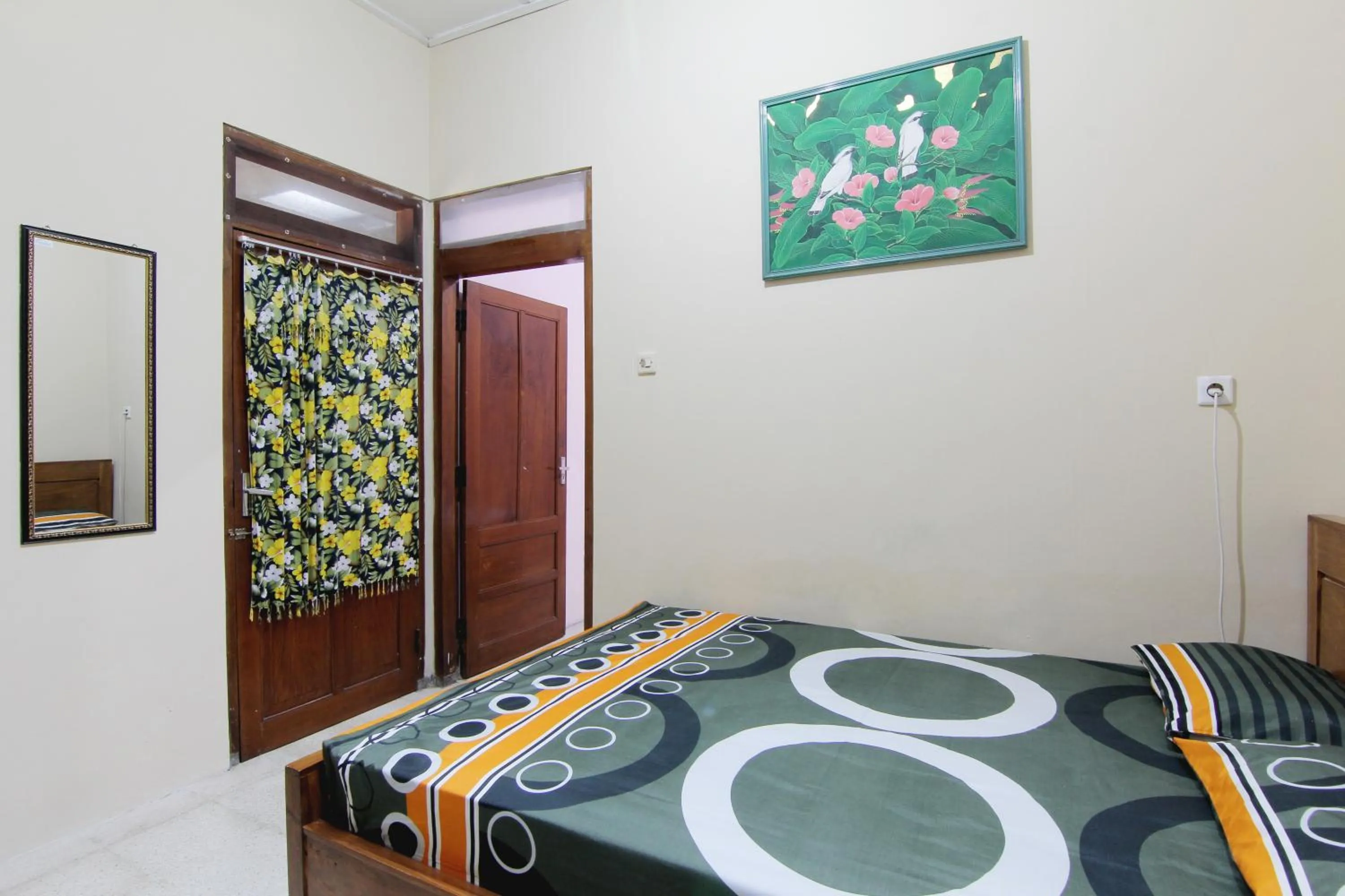 Bed in Batik Trinidar Homestay