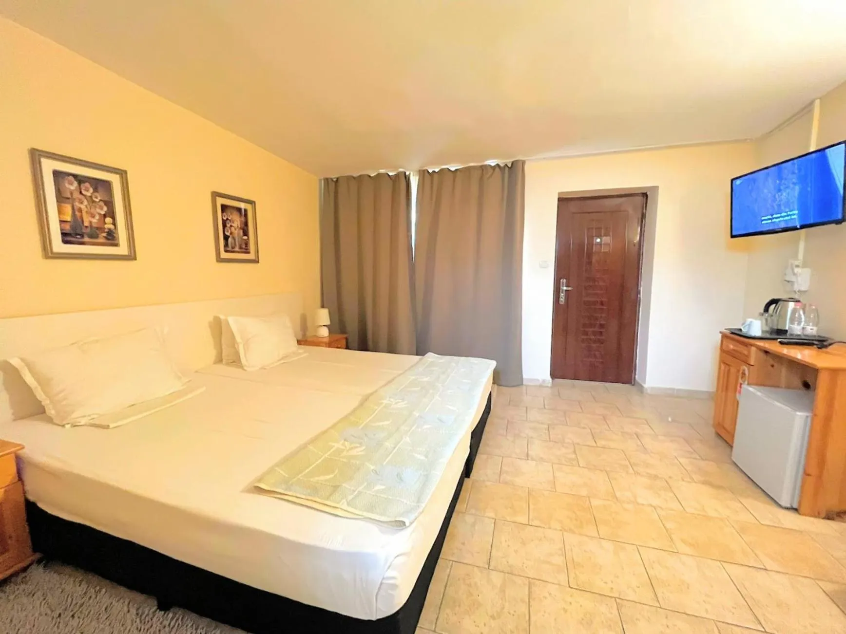 Photo of the whole room, Bed in Lotus Family Hotel - Free Parking