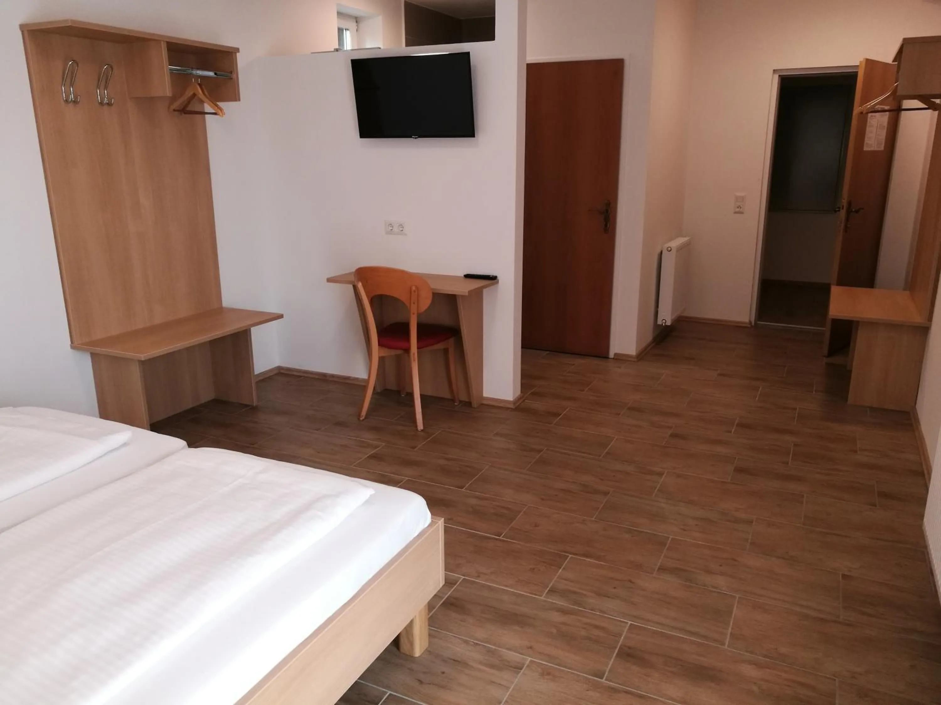 Bed in Dorf-Zimmer Mirth