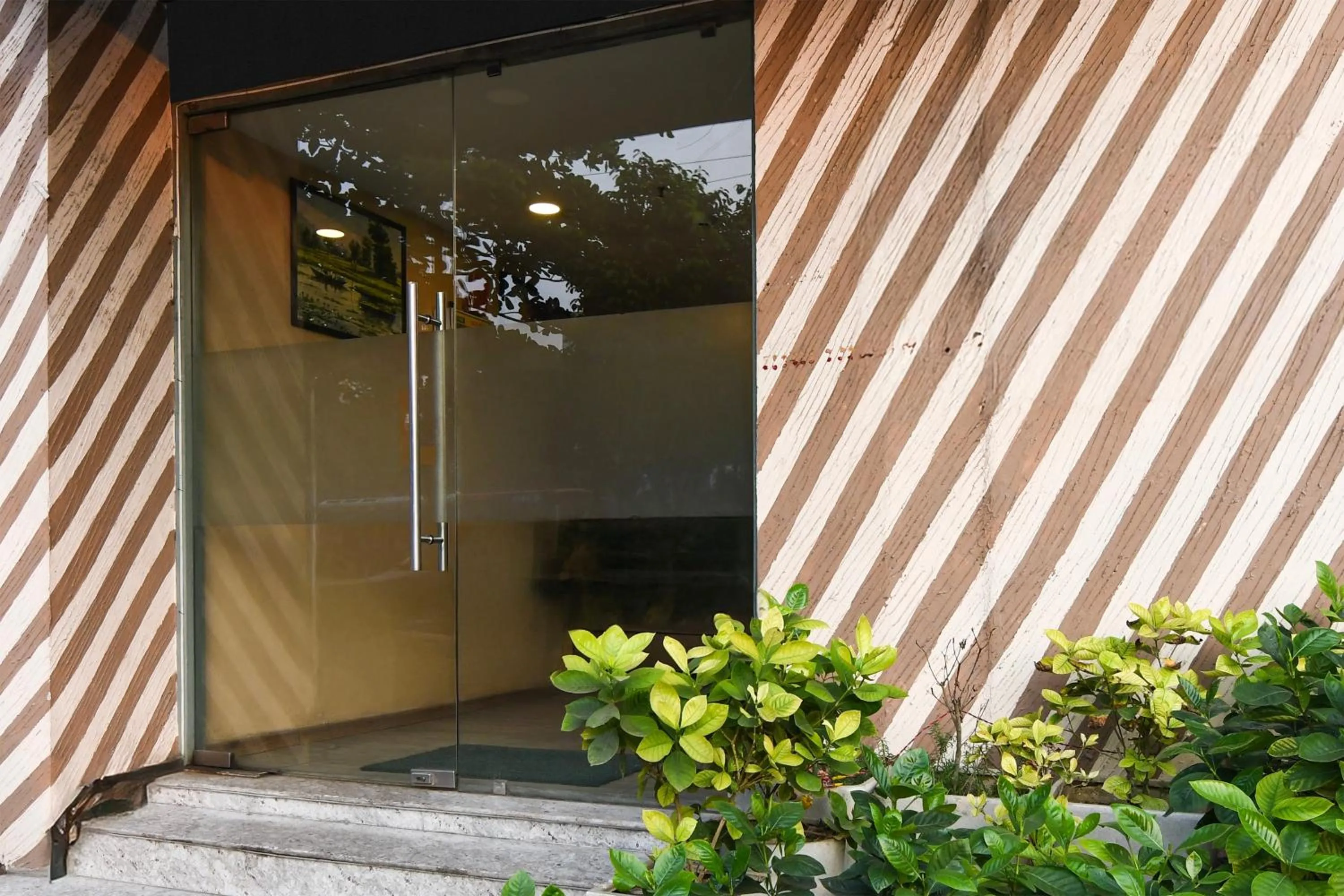 Facade/entrance in Super Townhouse VIP Road Formerly The Sky