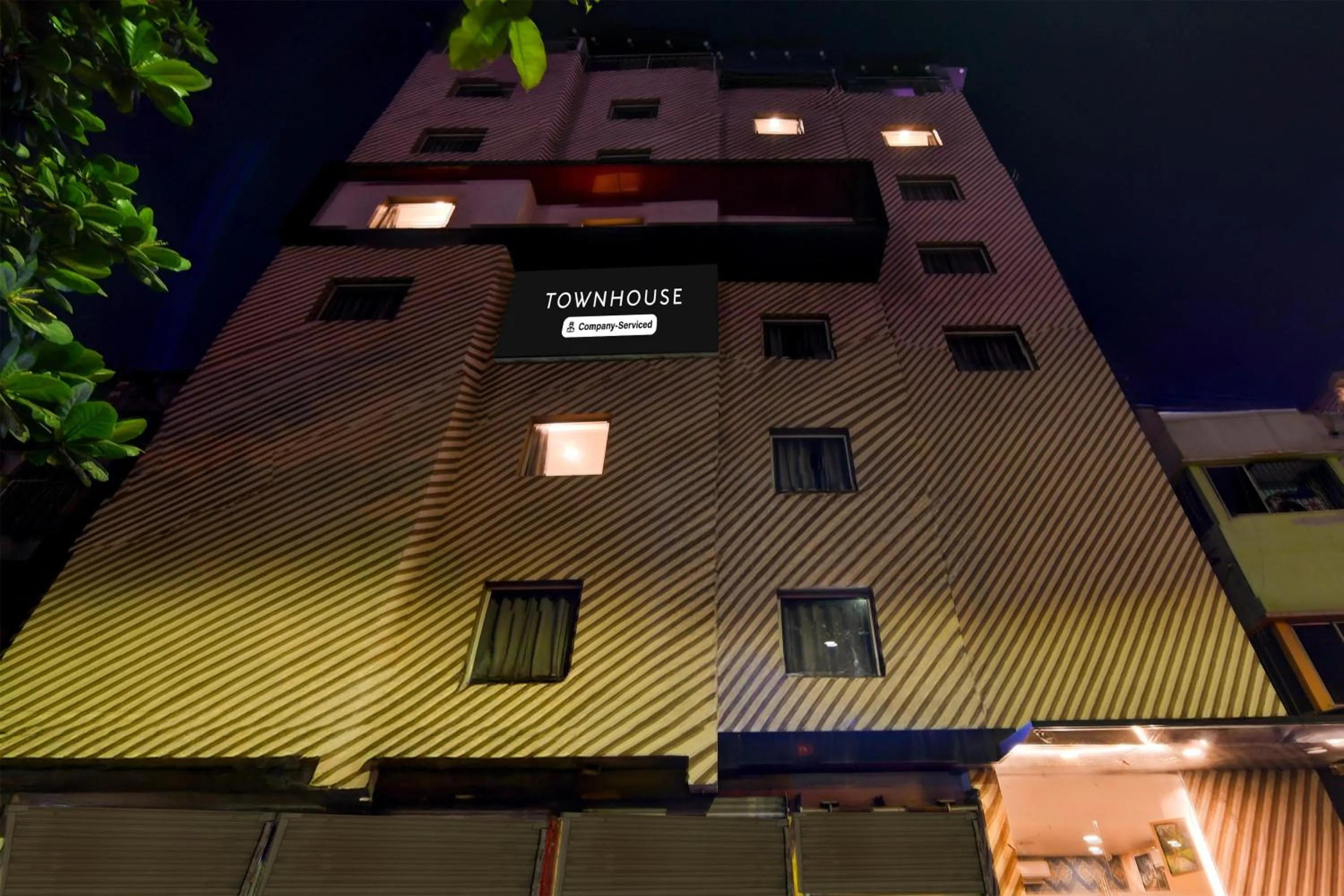 Facade/entrance in Super Townhouse VIP Road Formerly The Sky