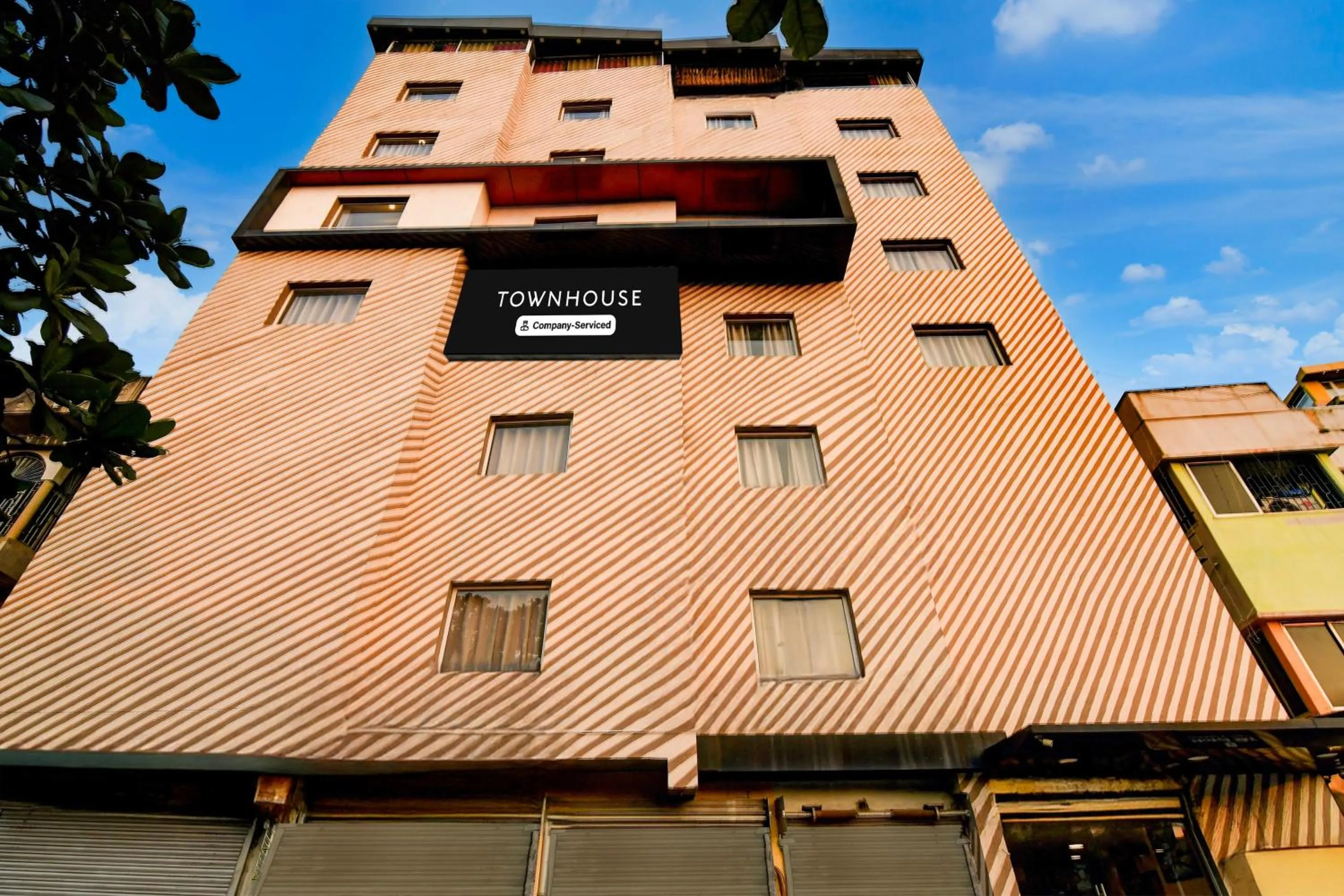 Facade/entrance in Super Townhouse VIP Road Formerly The Sky