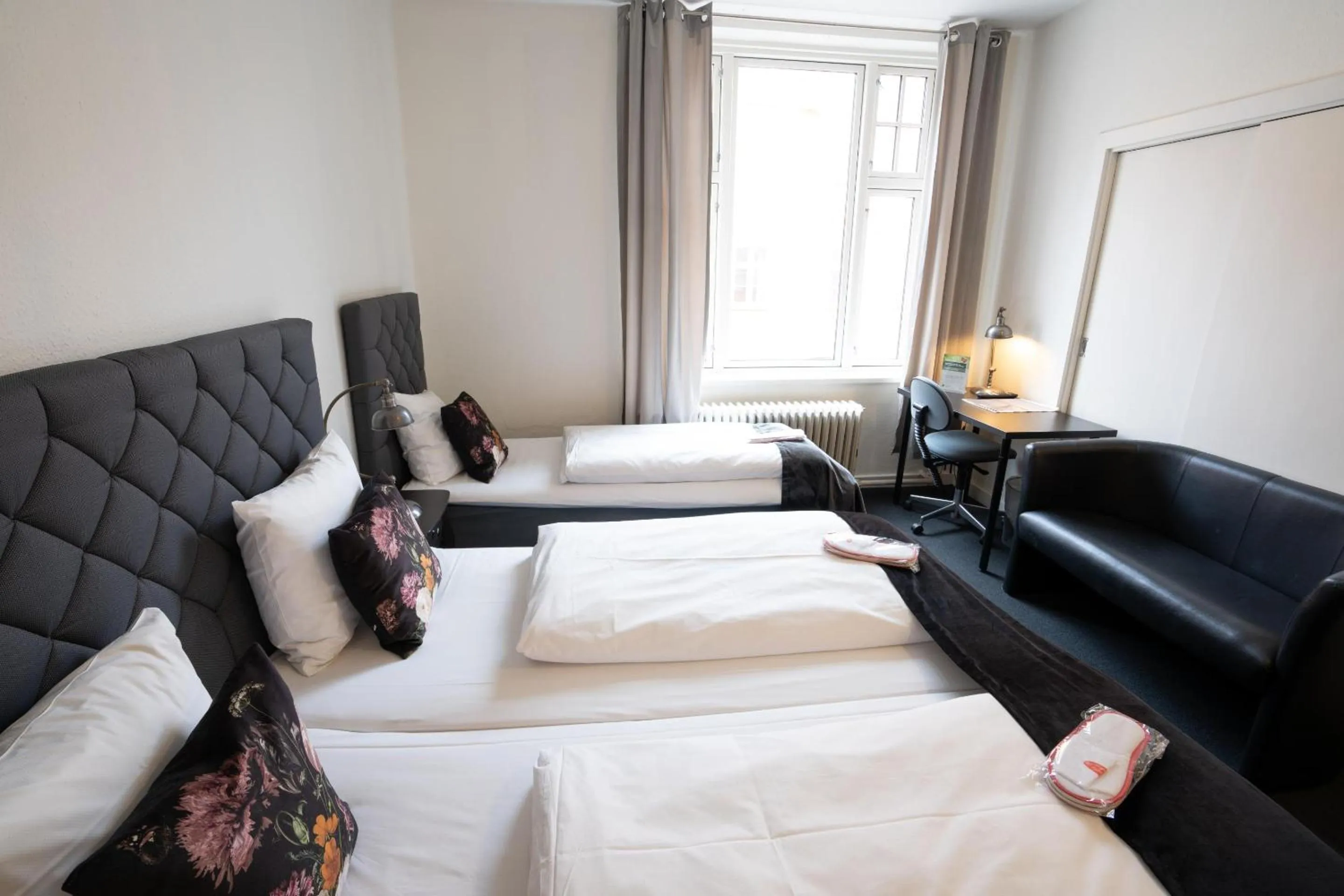 Bed in Hotel Vinhuset