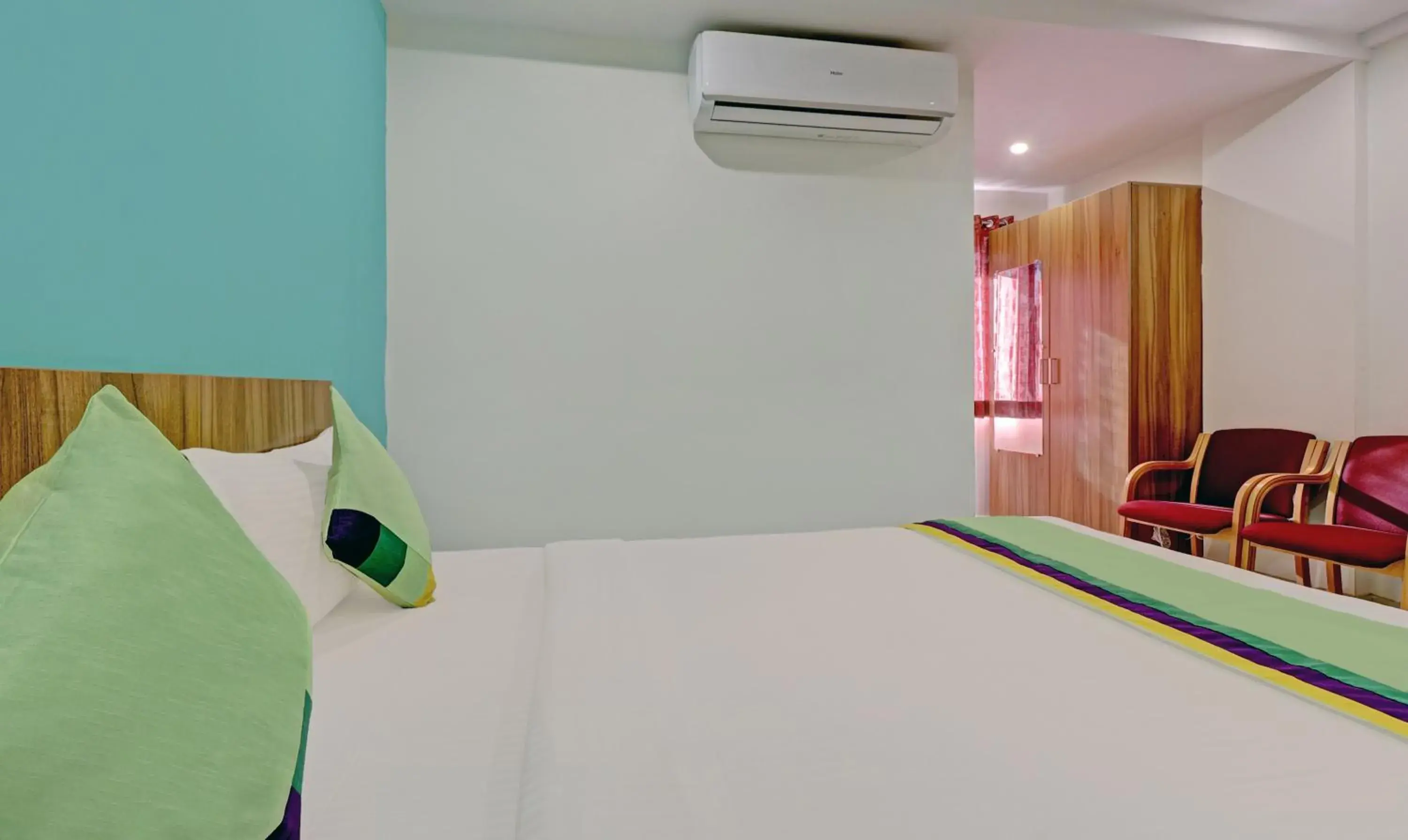 Bed in Treebo Sai Suites Inn Nagavara Bed in Treebo Sai Suites Inn Nagavara