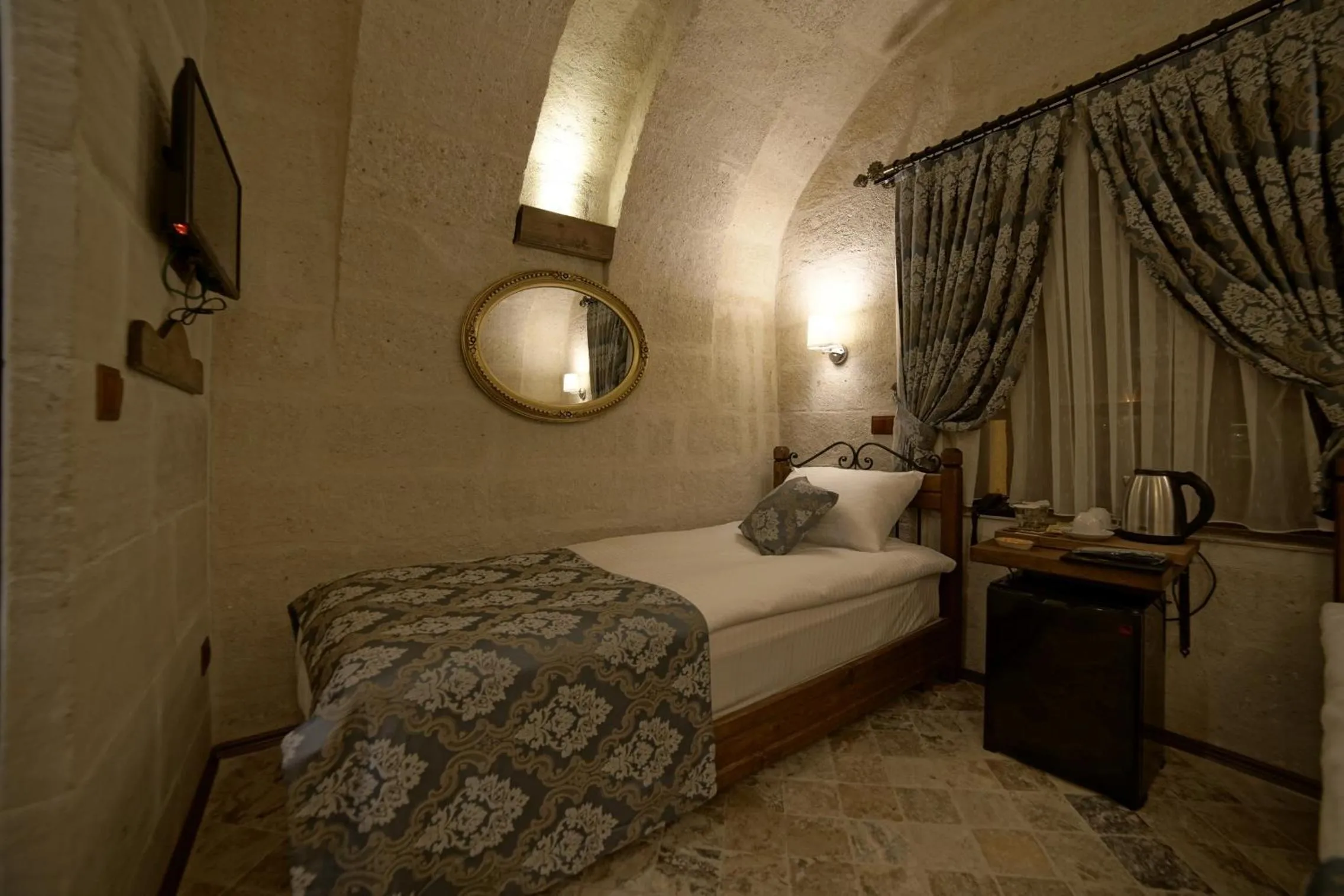Bed in Arte Cave Hotel