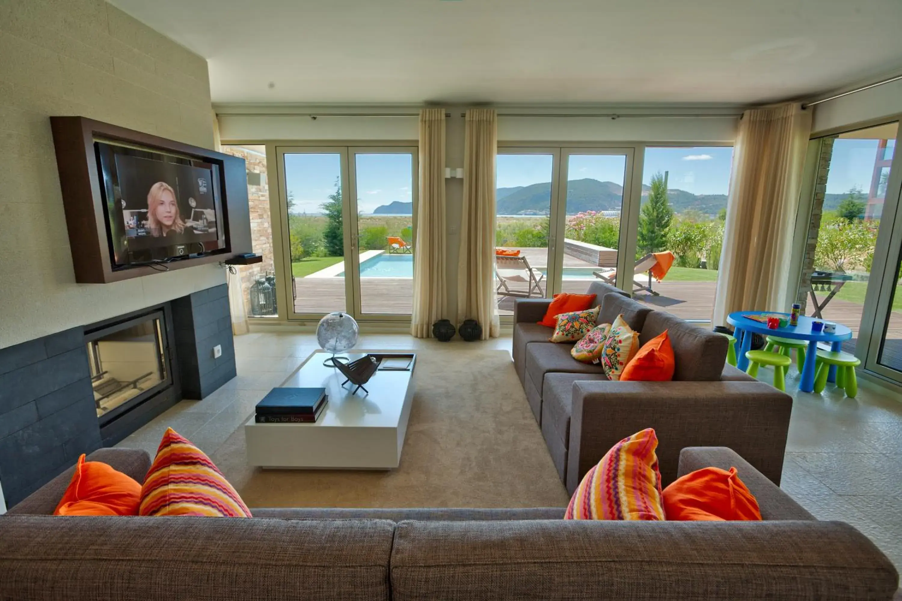 Living room in Troia Residence by The Editory - Apartamentos Praia Living room in Troia Residence by The Editory - Apartamentos Praia