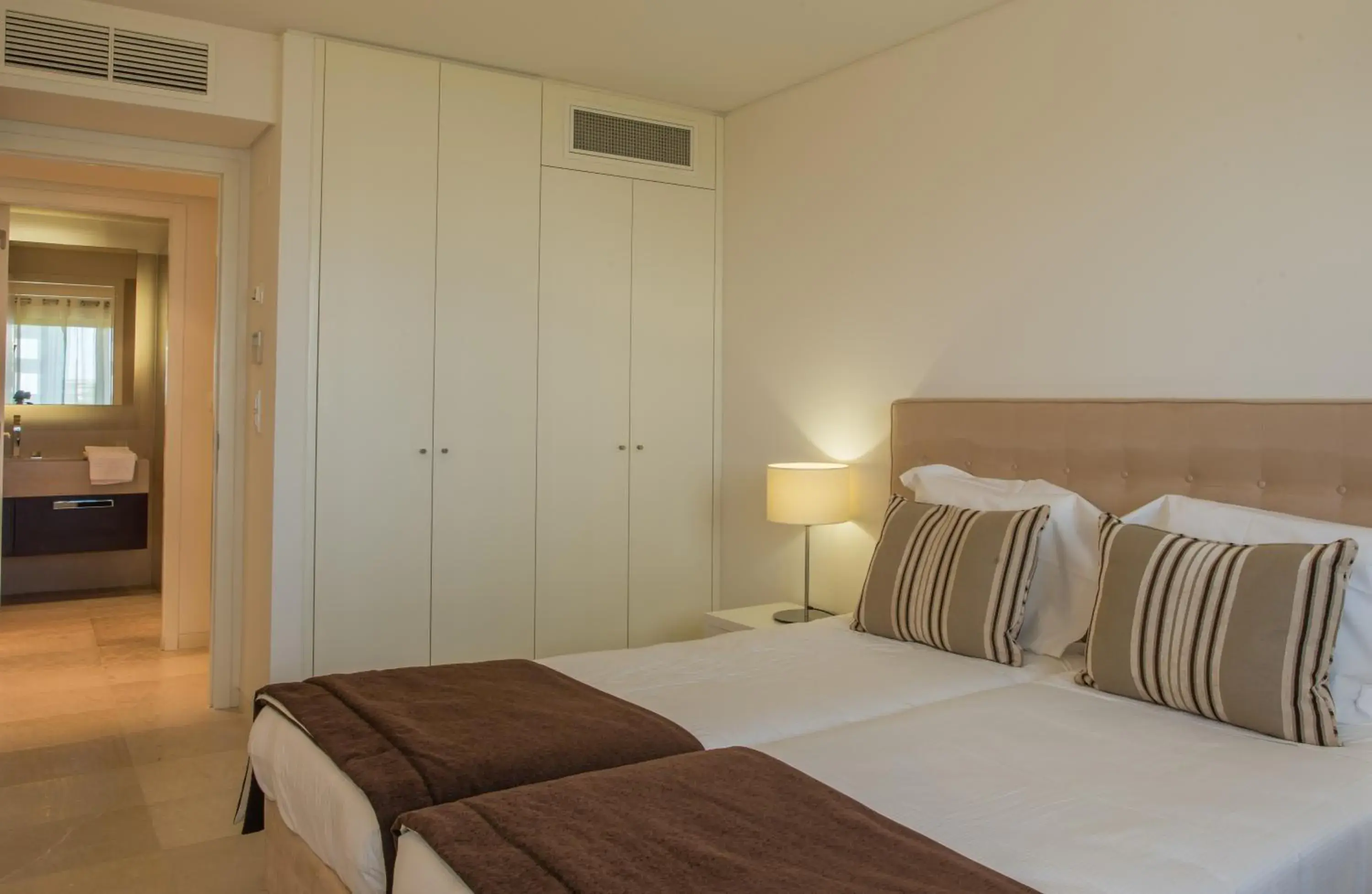 Bed in Troia Residence by The Editory - Apartamentos Praia Bed in Troia Residence by The Editory - Apartamentos Praia