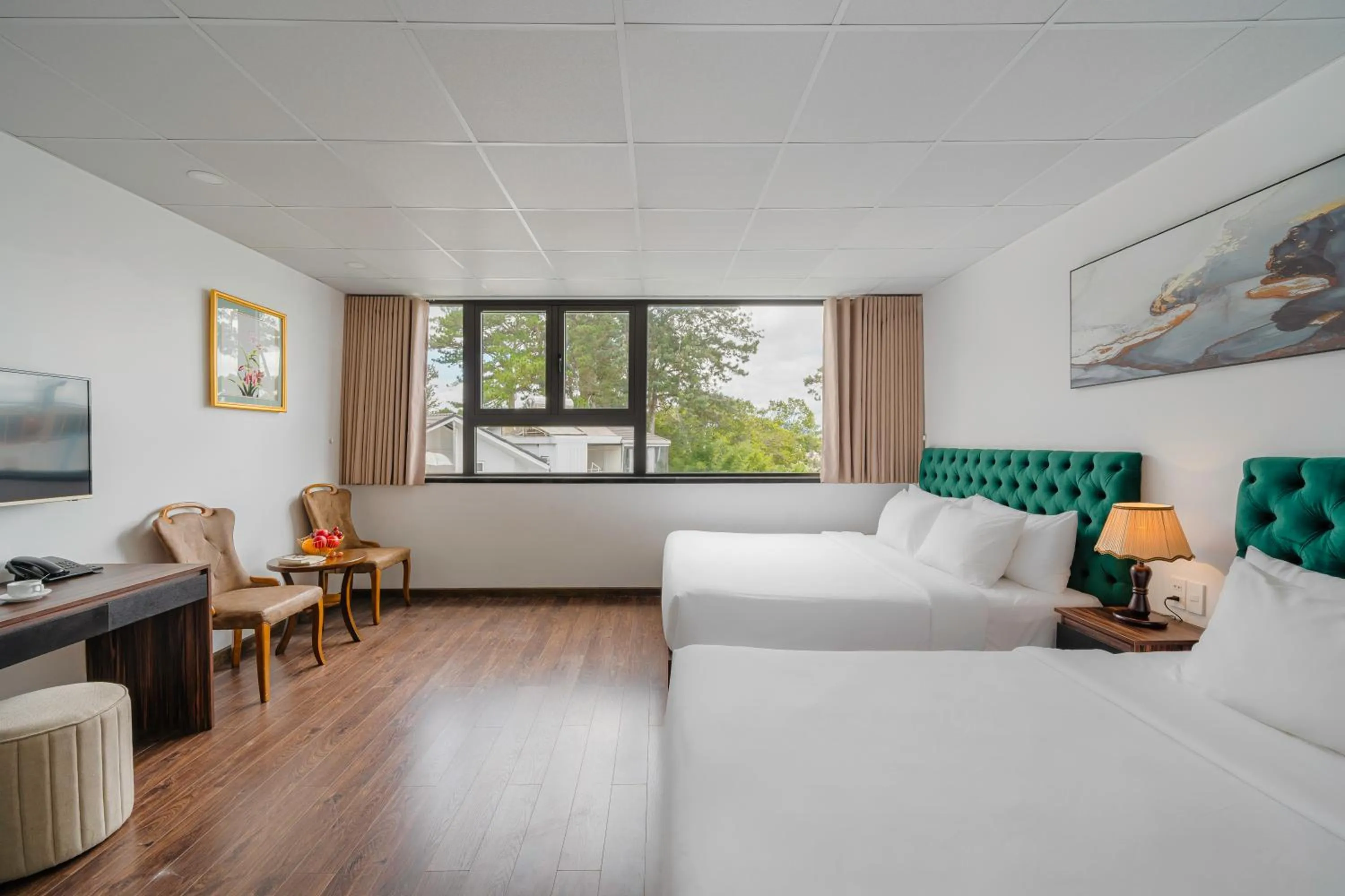 Bed in TTR Moonstone Apart Hotel