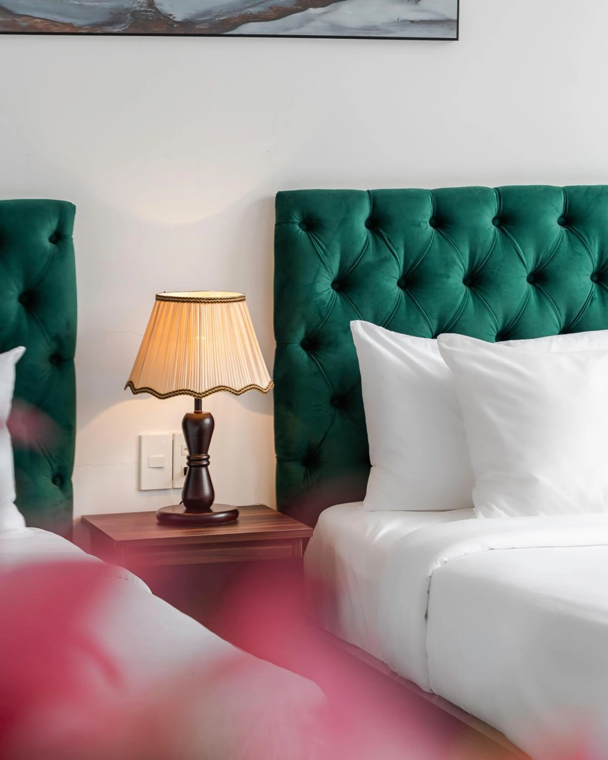 Bed in TTR Moonstone Apart Hotel