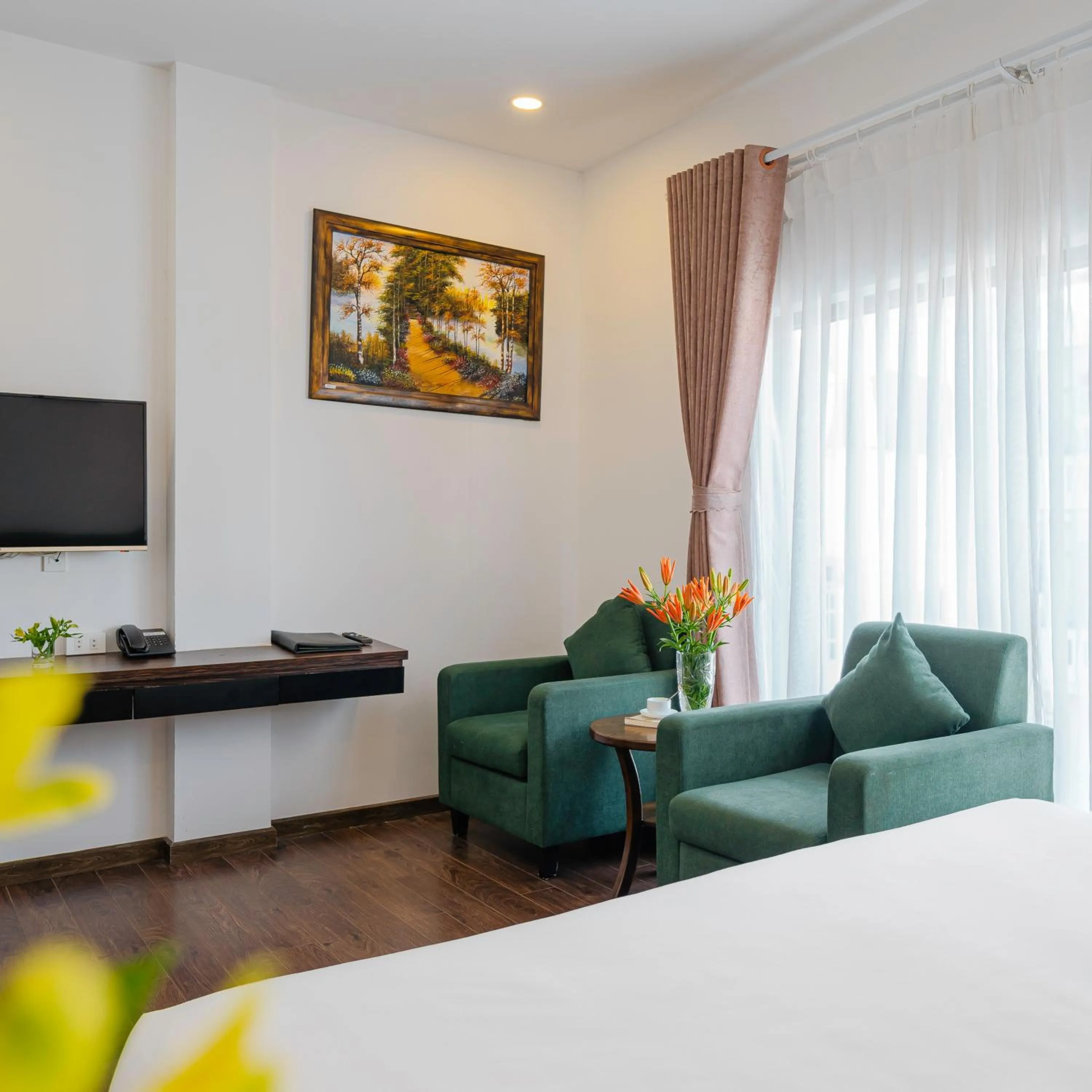 Bed in TTR Moonstone Apart Hotel