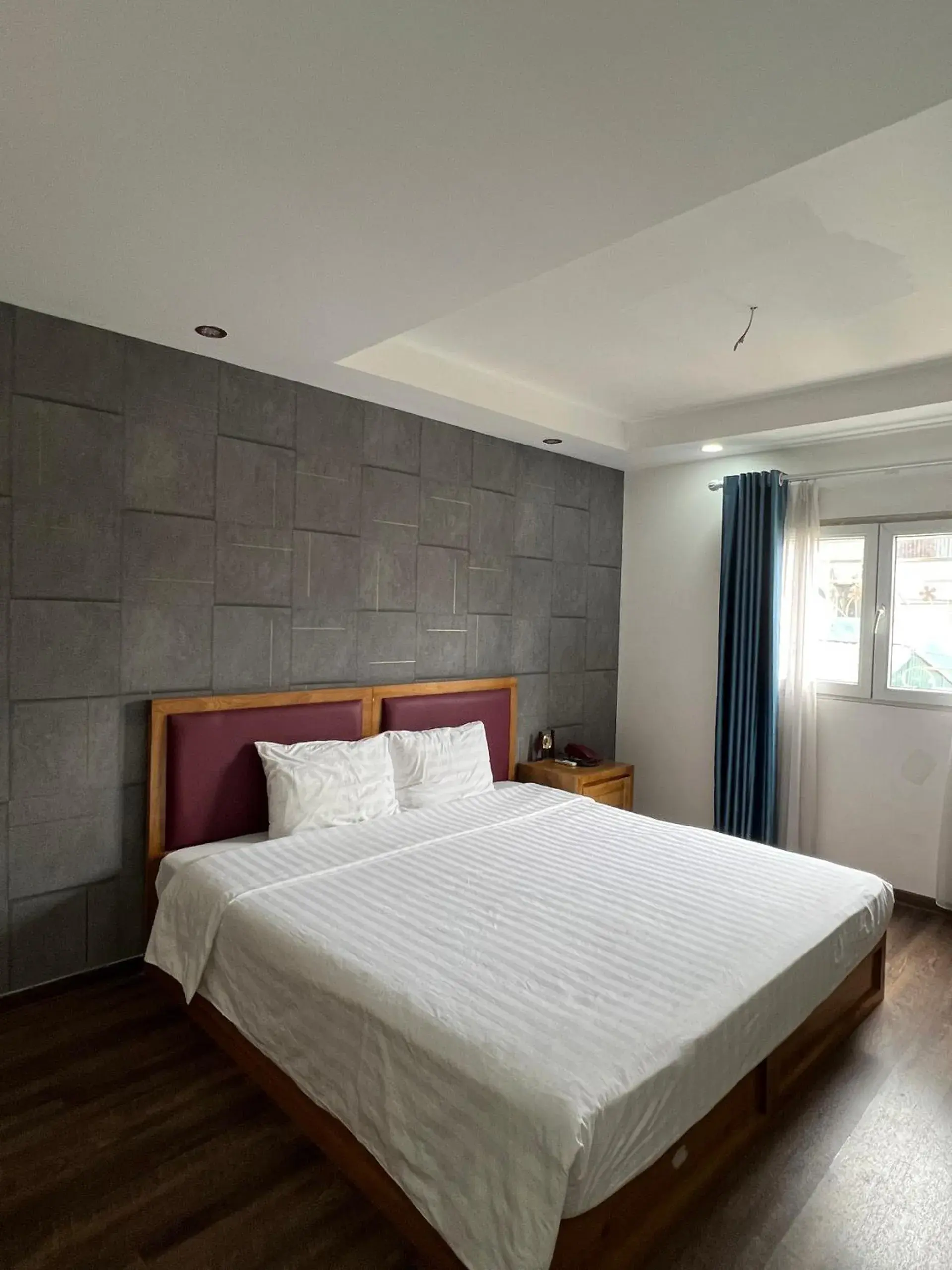 Bedroom, Bed in Holiday Suites Hotel & Spa Bedroom, Bed in Holiday Suites Hotel & Spa