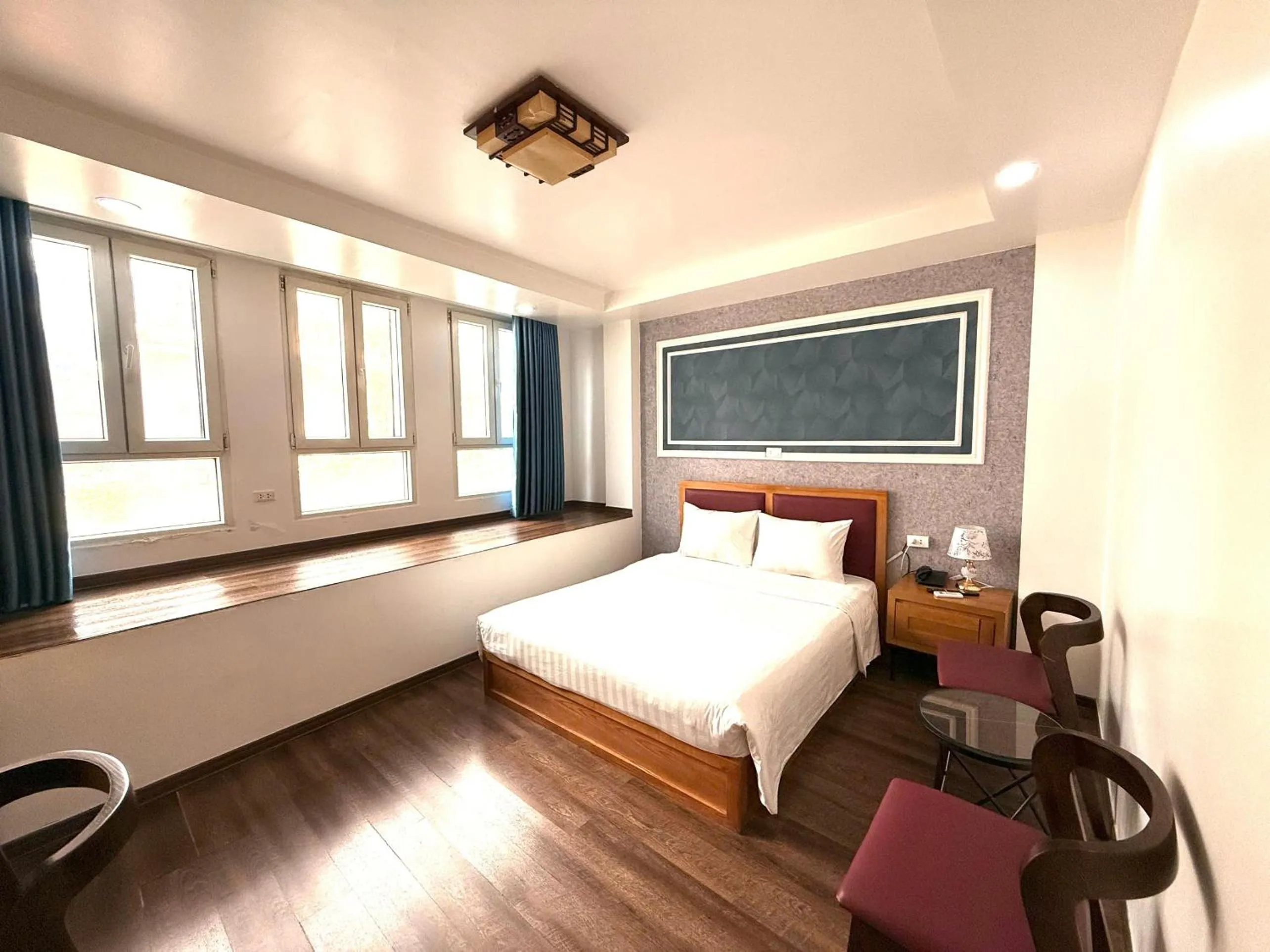 Bed in Holiday Suites Hotel & Spa