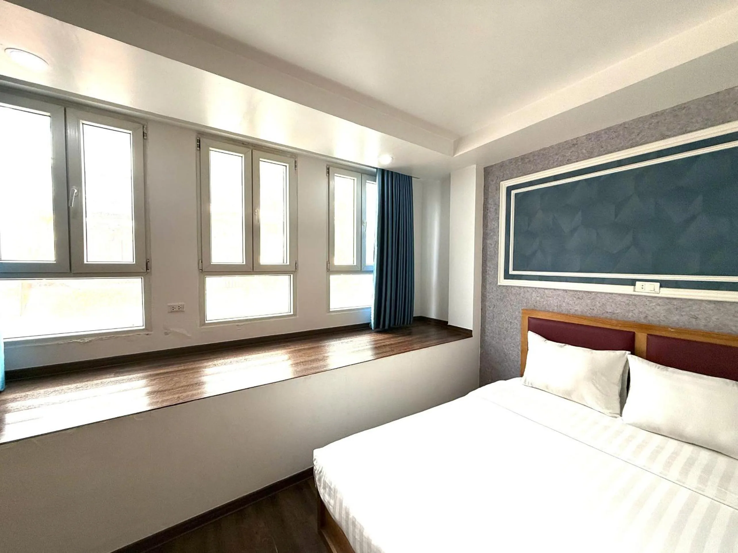 Bed in Holiday Suites Hotel & Spa