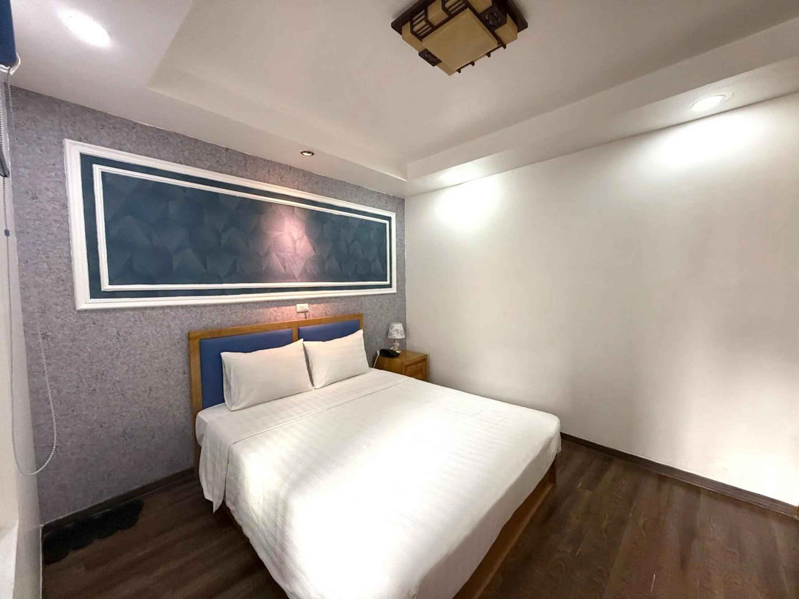 Bedroom, Bed in Holiday Suites Hotel & Spa